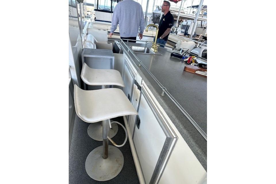 2008 Destination Yachts 45X14 interior with bar stools and countertop.