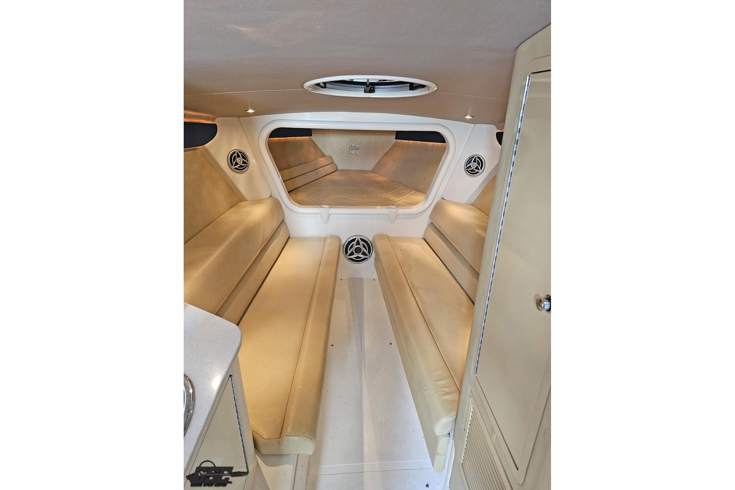 Interior of 2007 Hustler 41 Razor boat with beige seating and modern design.