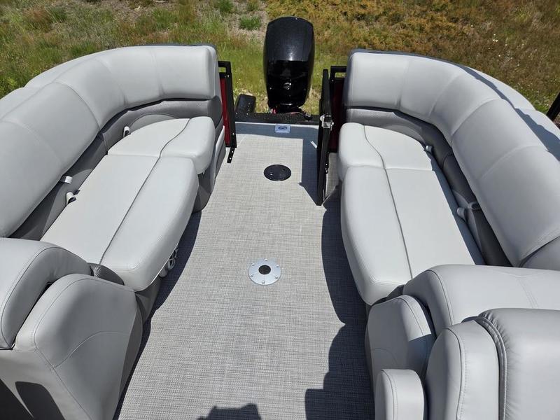 2025 Regency 230 DL3 pontoon boat with spacious seating and modern design.