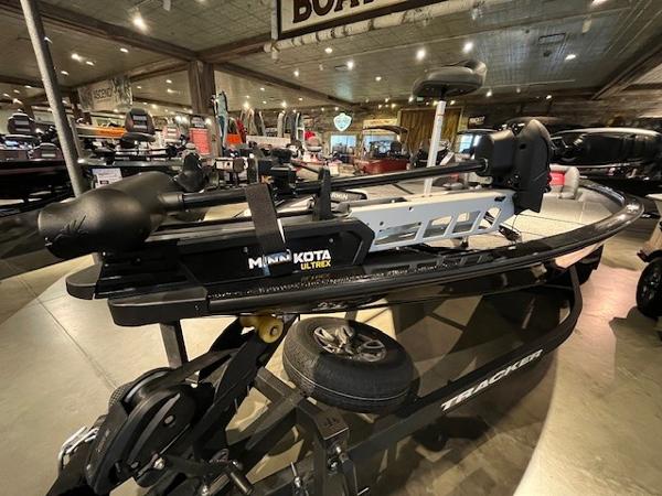 2025 Tracker Savage 215 boat with Minn Kota Ultrex motor in showroom.