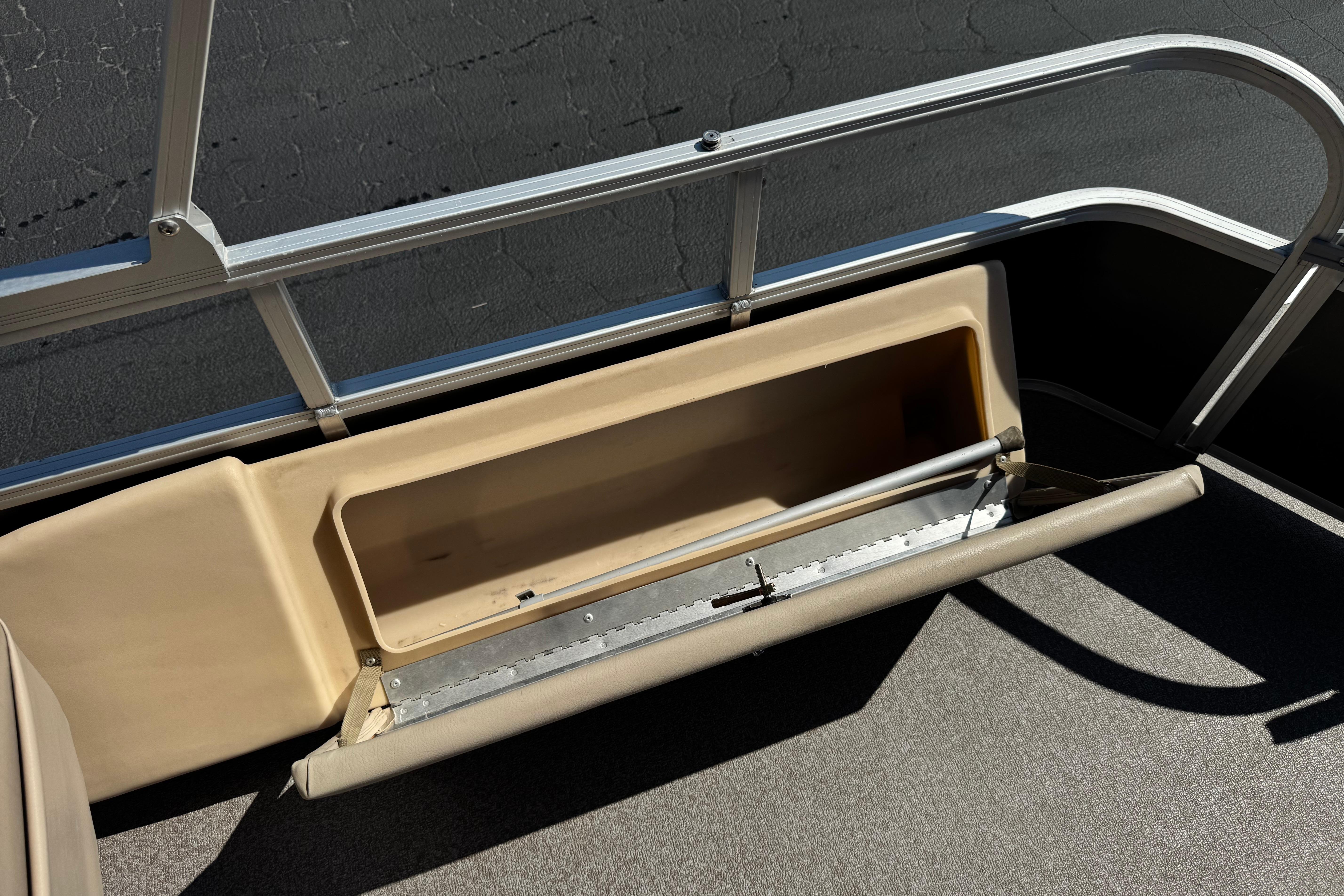 Open storage compartment on 2018 Sun Tracker SportFish 22 DLX pontoon boat.
