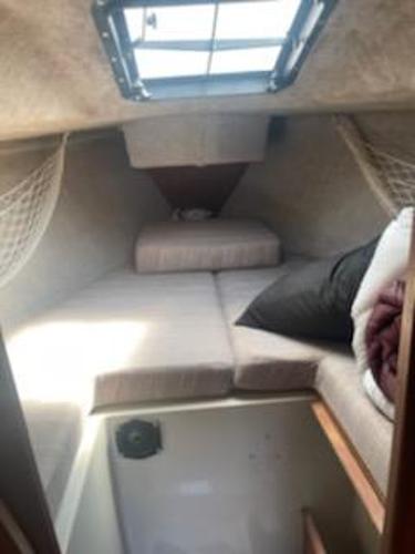 Interior of a 1988 O'Day 272 LE yacht with cozy sleeping cabin.