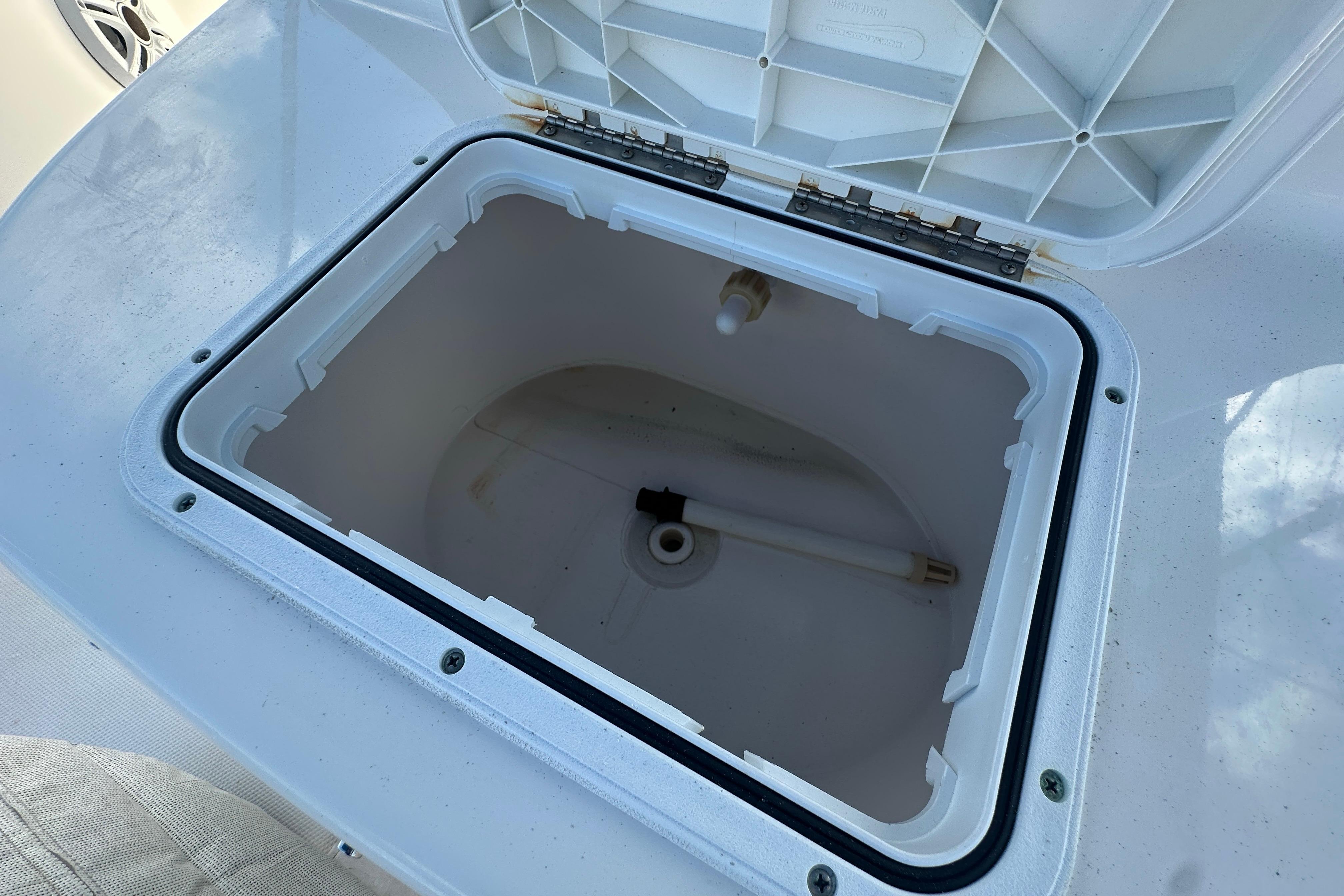 Open storage compartment on 2015 Tidewater 2000 Carolina Bay boat.