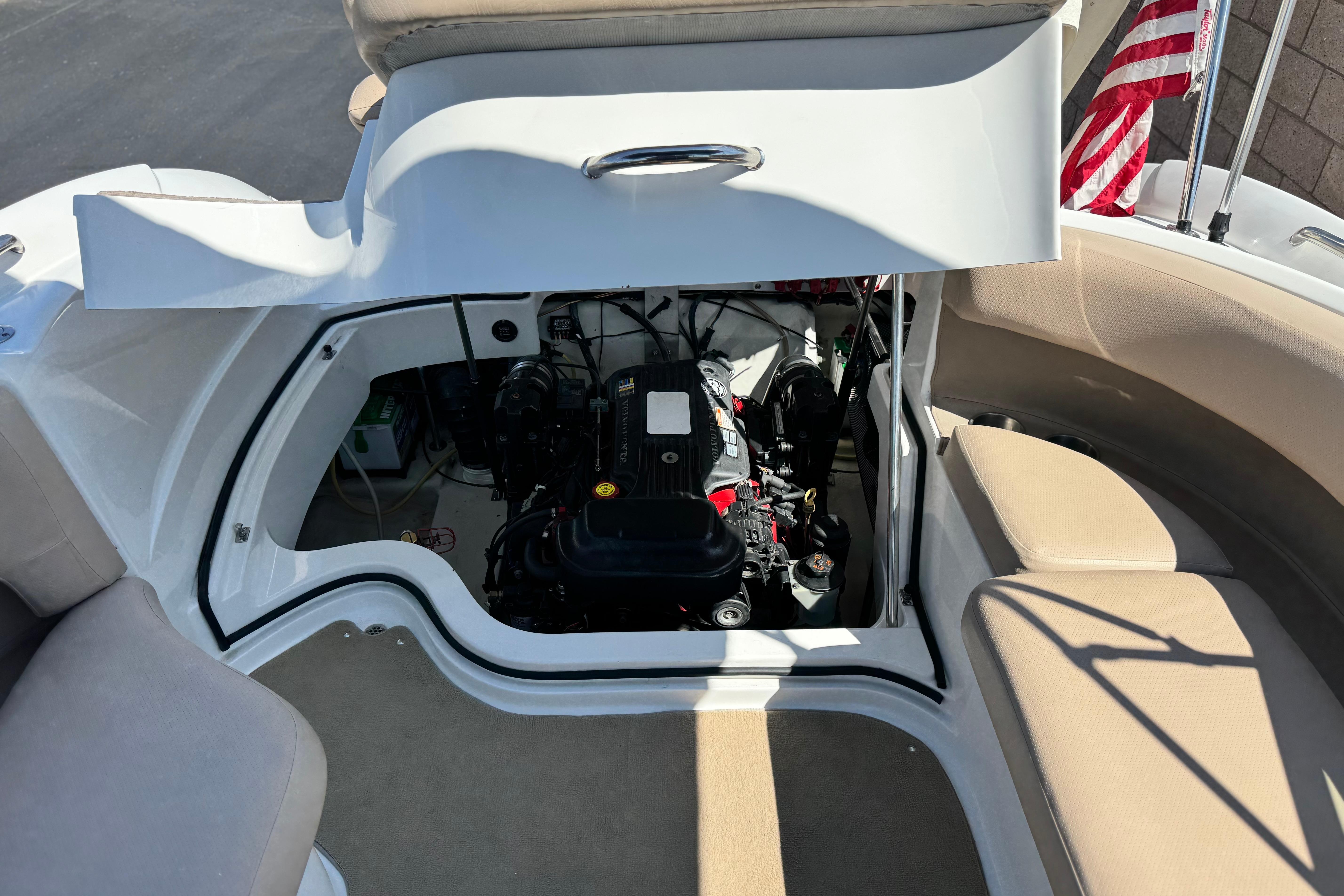 Open engine compartment of a 2008 Cobalt 262 boat, showcasing interior mechanics.