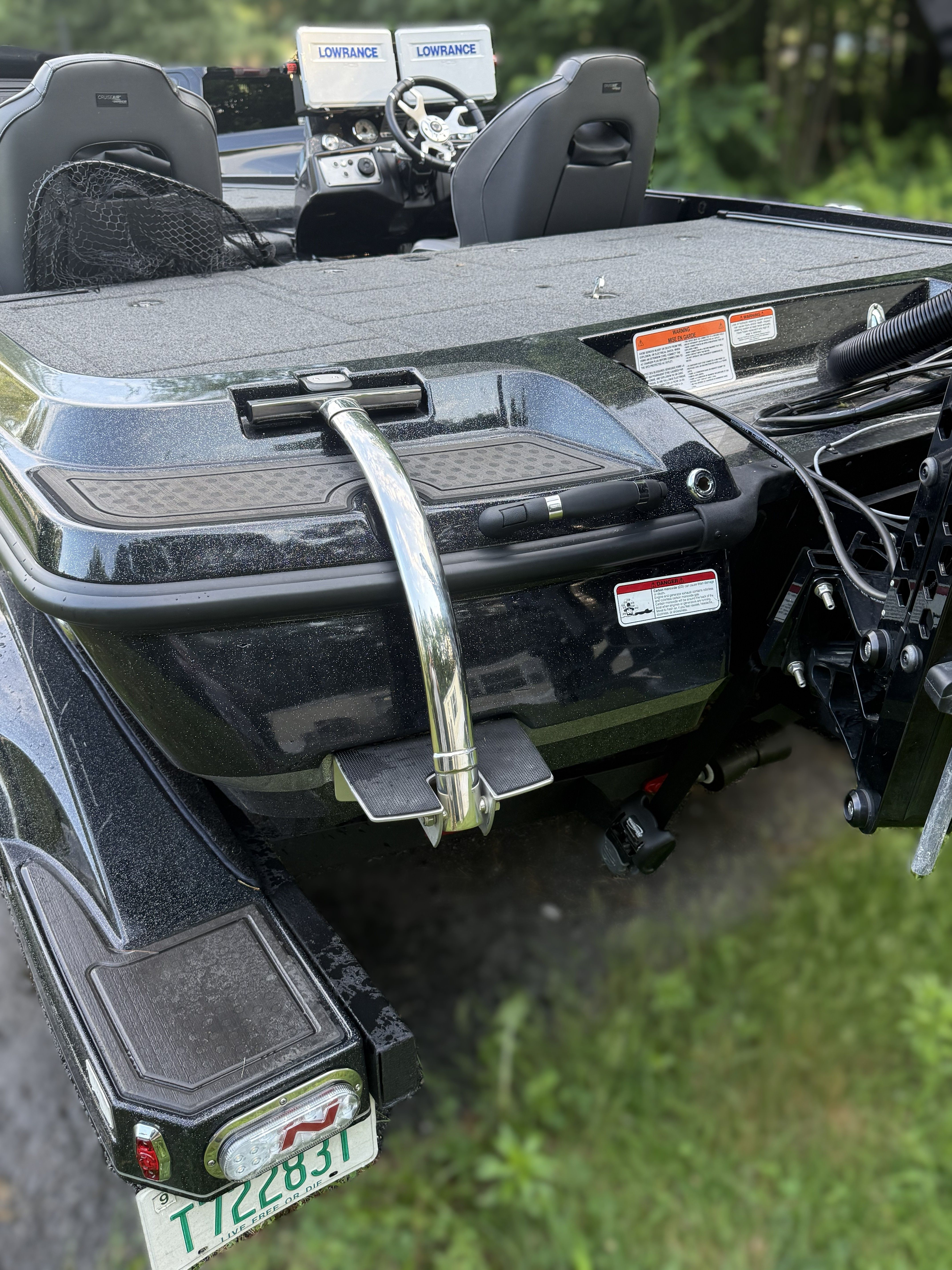 The image shows the rear of a 2023 Nitro Z21 XL Pro boat with two seats and a helm.
