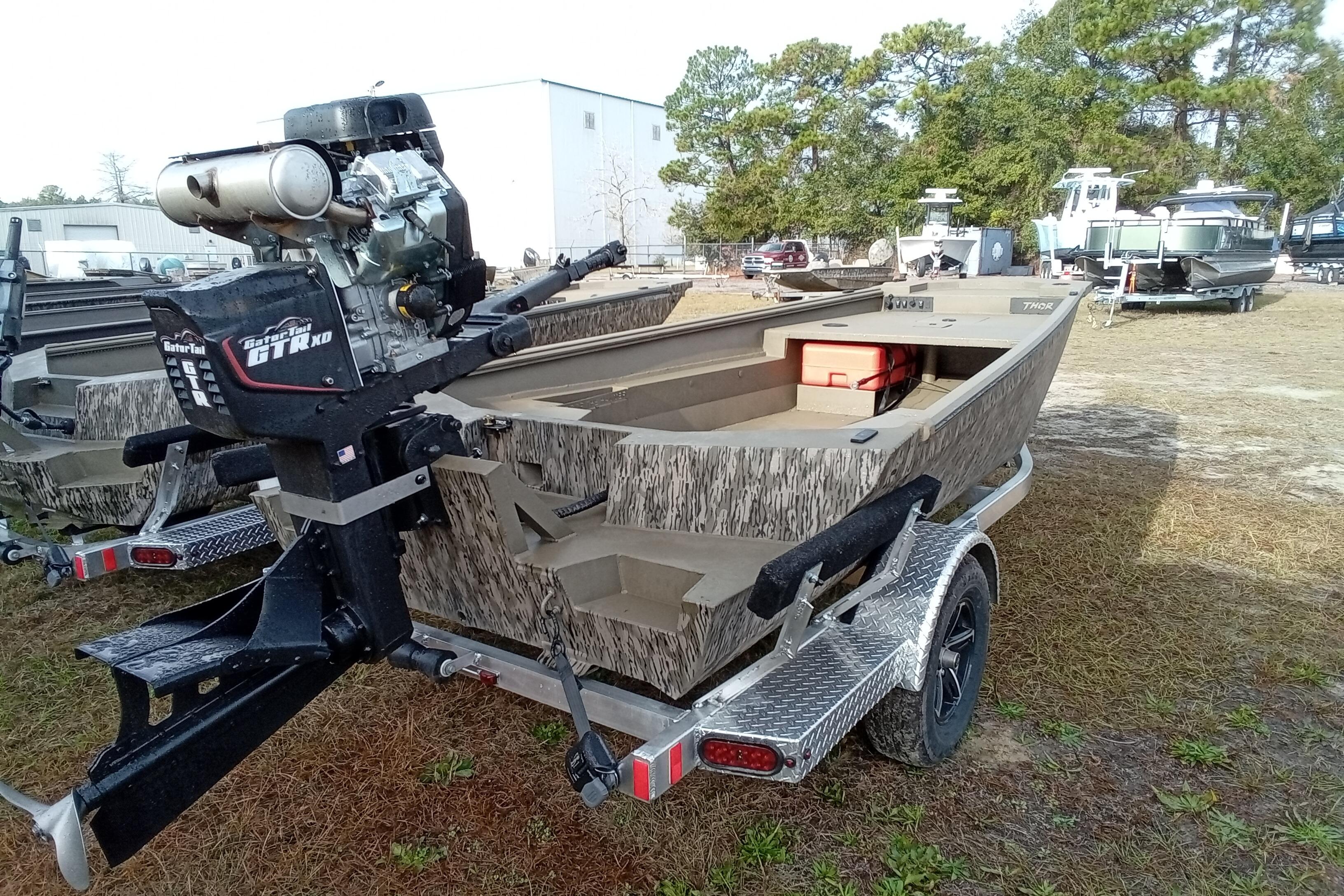 2026 Thor 1754 Swamp Hammer boat with powerful motor on a trailer.
