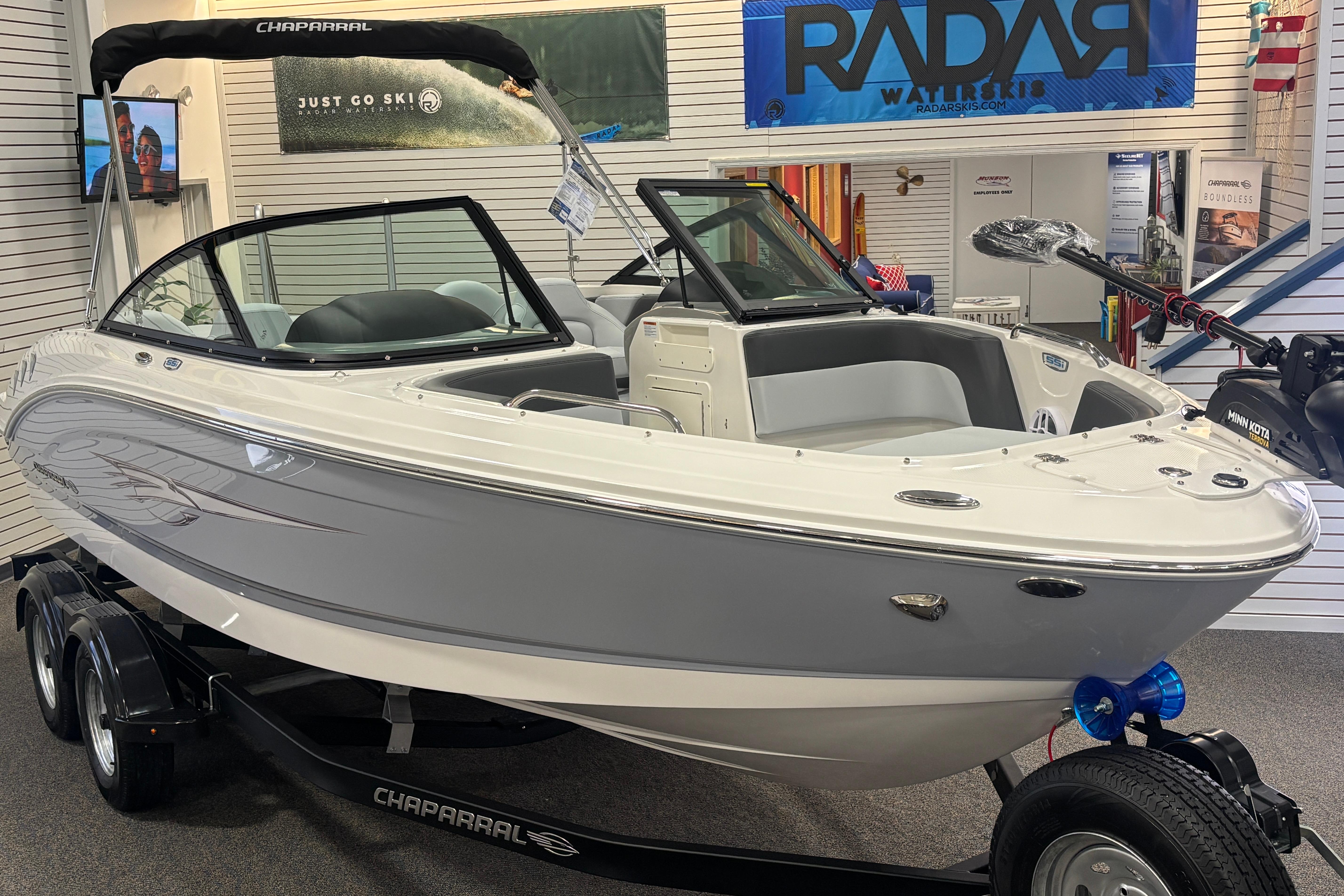 2026 Chaparral 21 SSi Ski & Fish boat in showroom.