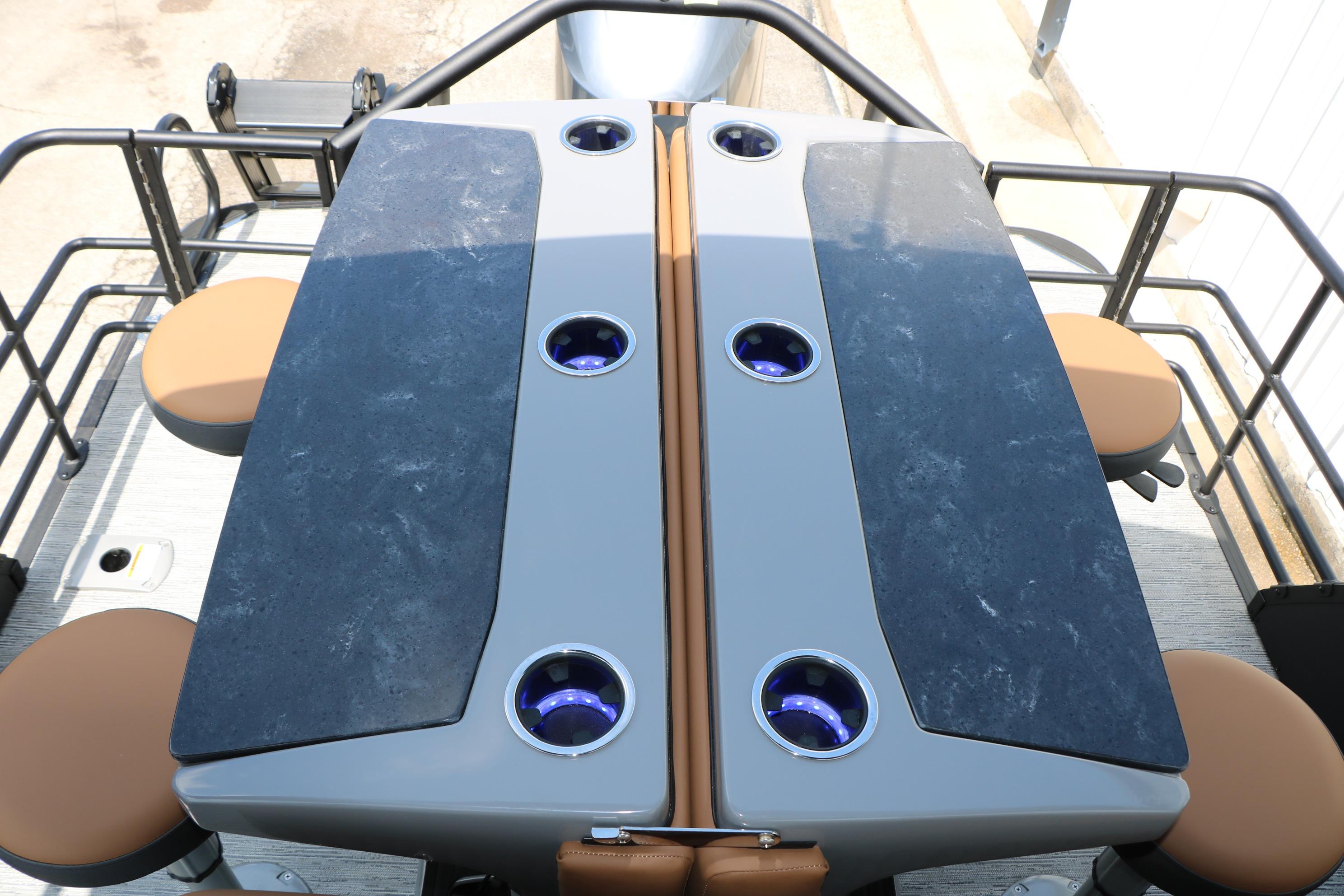 2026 Sylvan L3 DLZ Bar Platinum Edition Tri-Toon with sleek bar seating and cup holders.