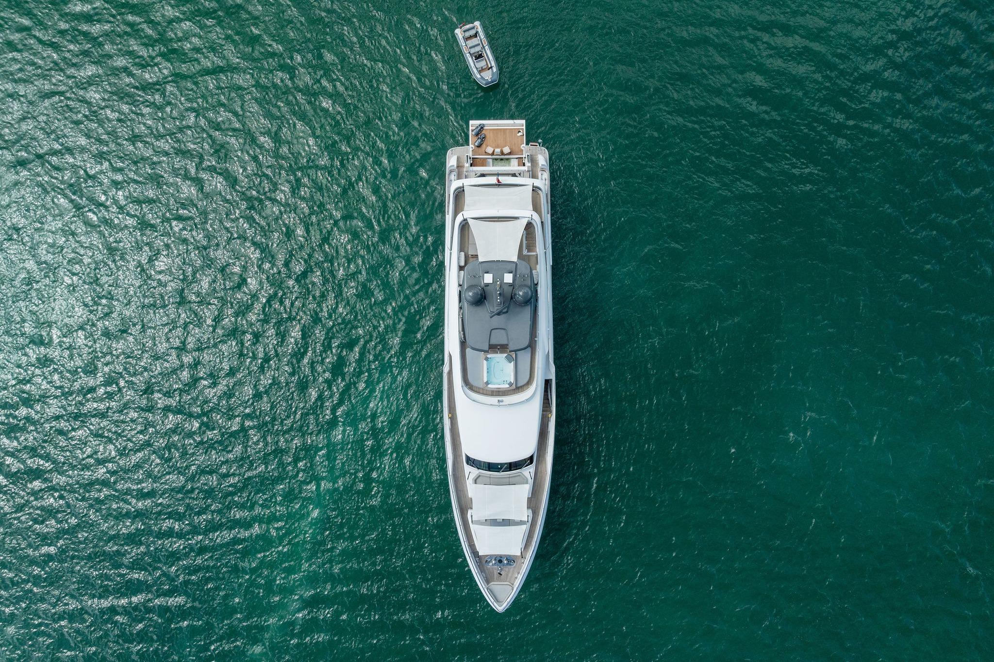 Aerial view of 2023 Custom Line Navetta 33 yacht on open water.