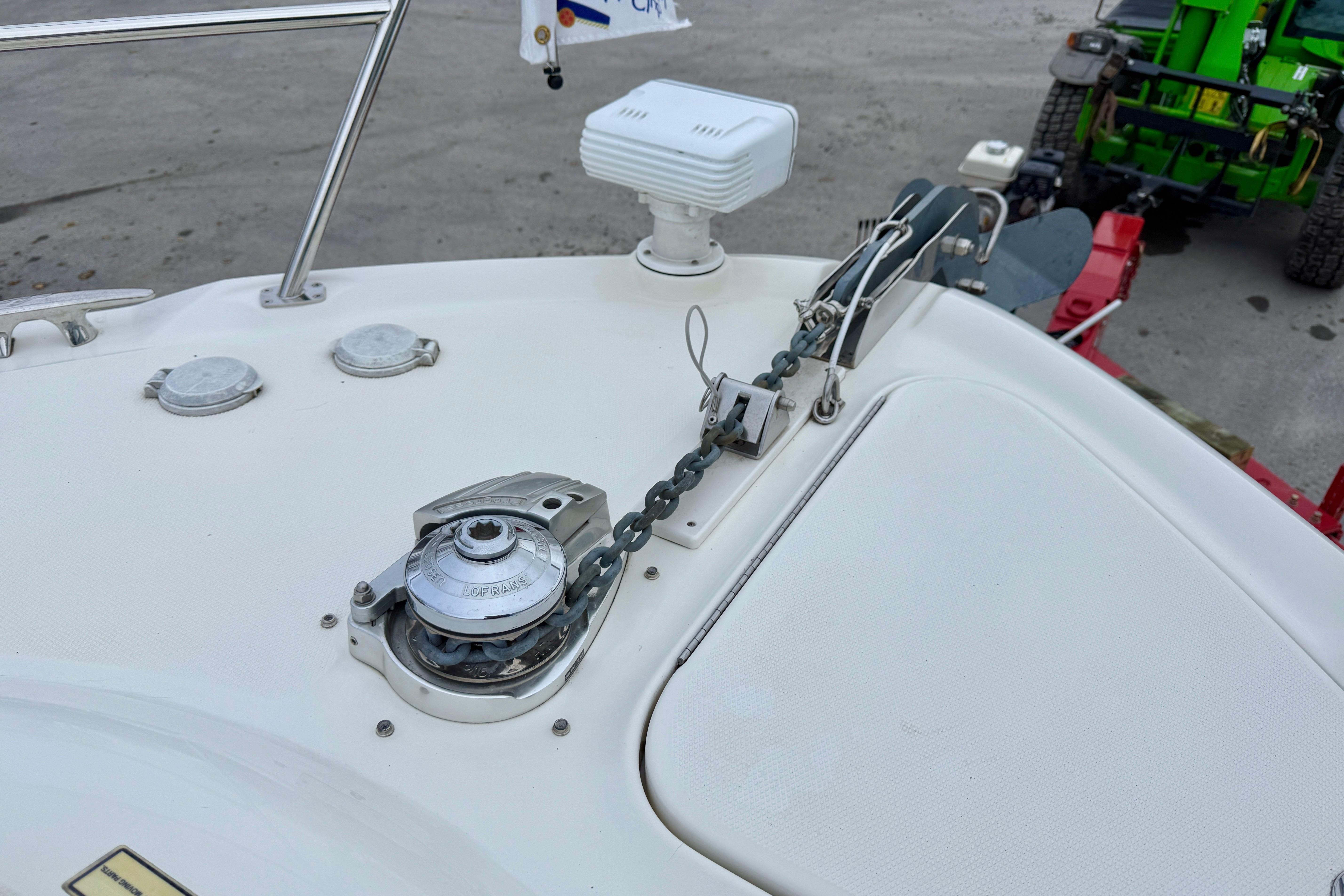 2004 Searay 360 Sundancer boat anchor system with chain and winch on deck.