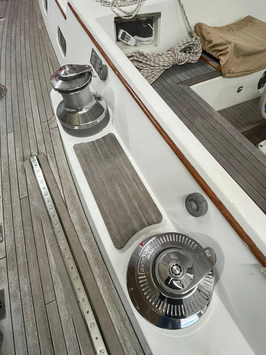 Deck of 2001 Hinckley Sou'wester 59 CC sailboat with winches and teak flooring.