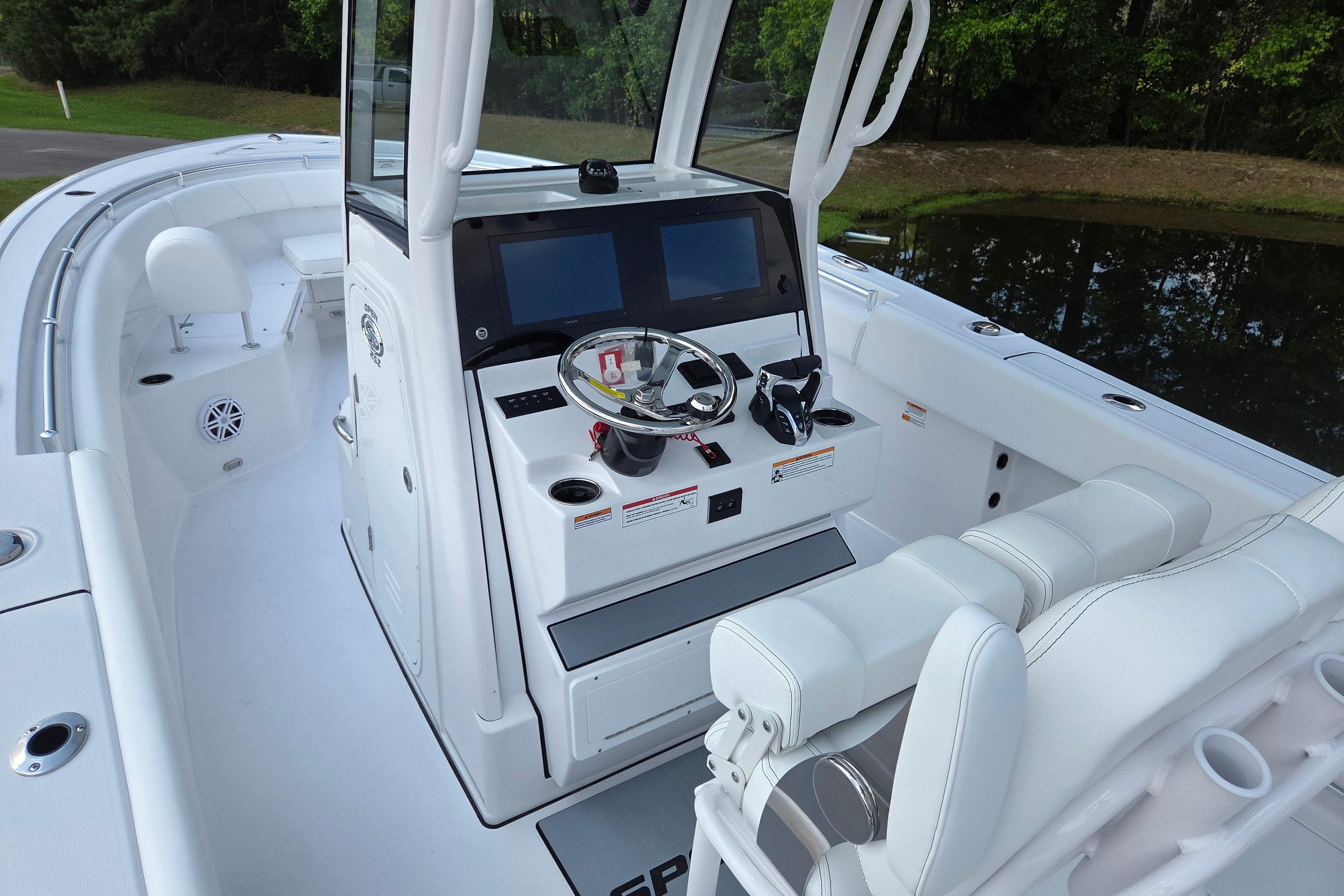 2026 Sportsman Open 252 Center Console boat interior with modern helm and seating.