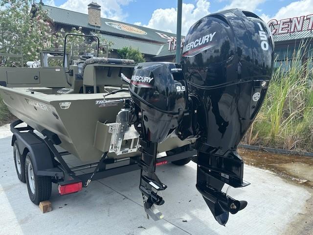 2025 Tracker Grizzly 2072 CC Sportsman Kicker boat with dual Mercury outboard motors.