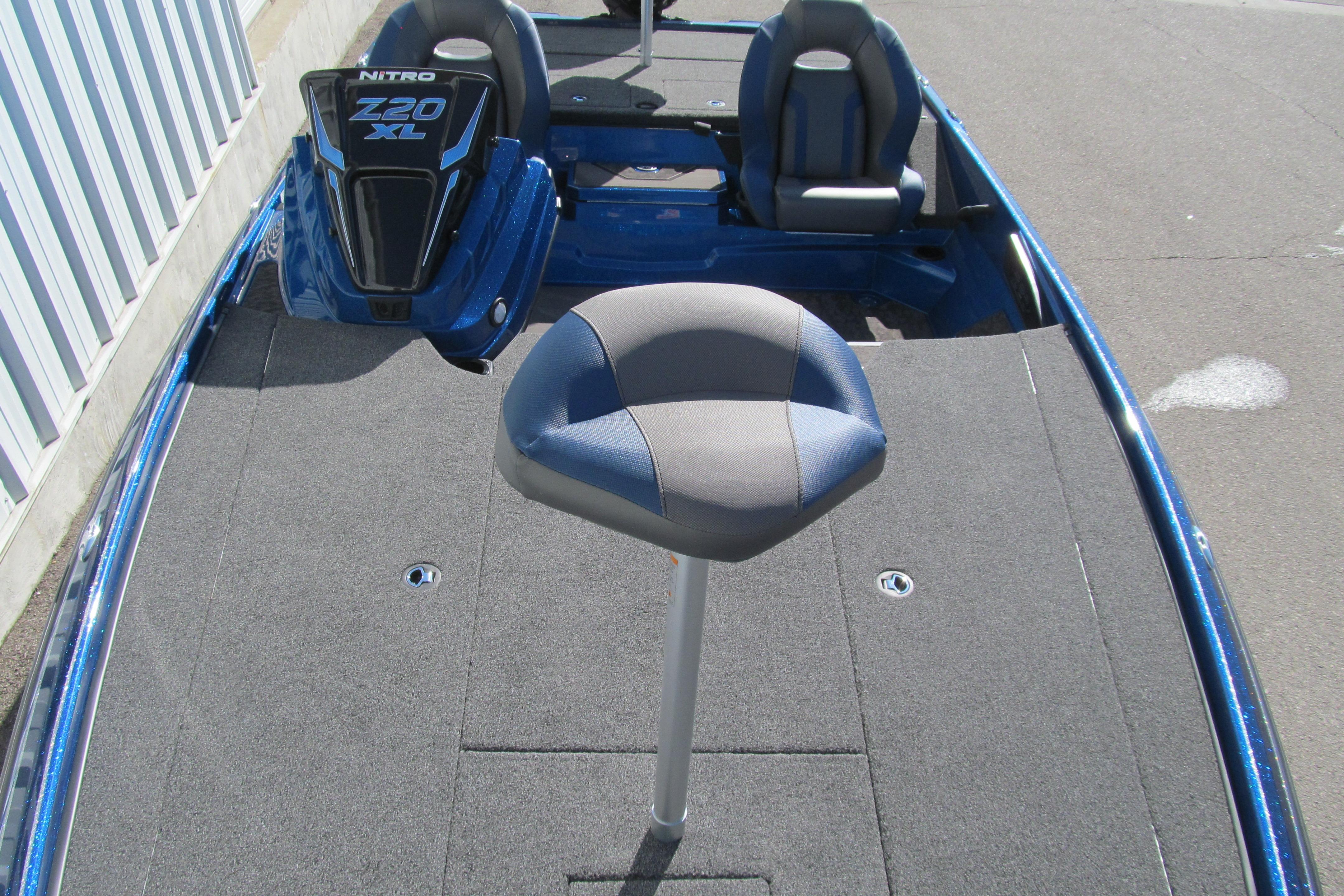 2026 Nitro Z20 XL Pro boat interior with seating and carpeted deck.