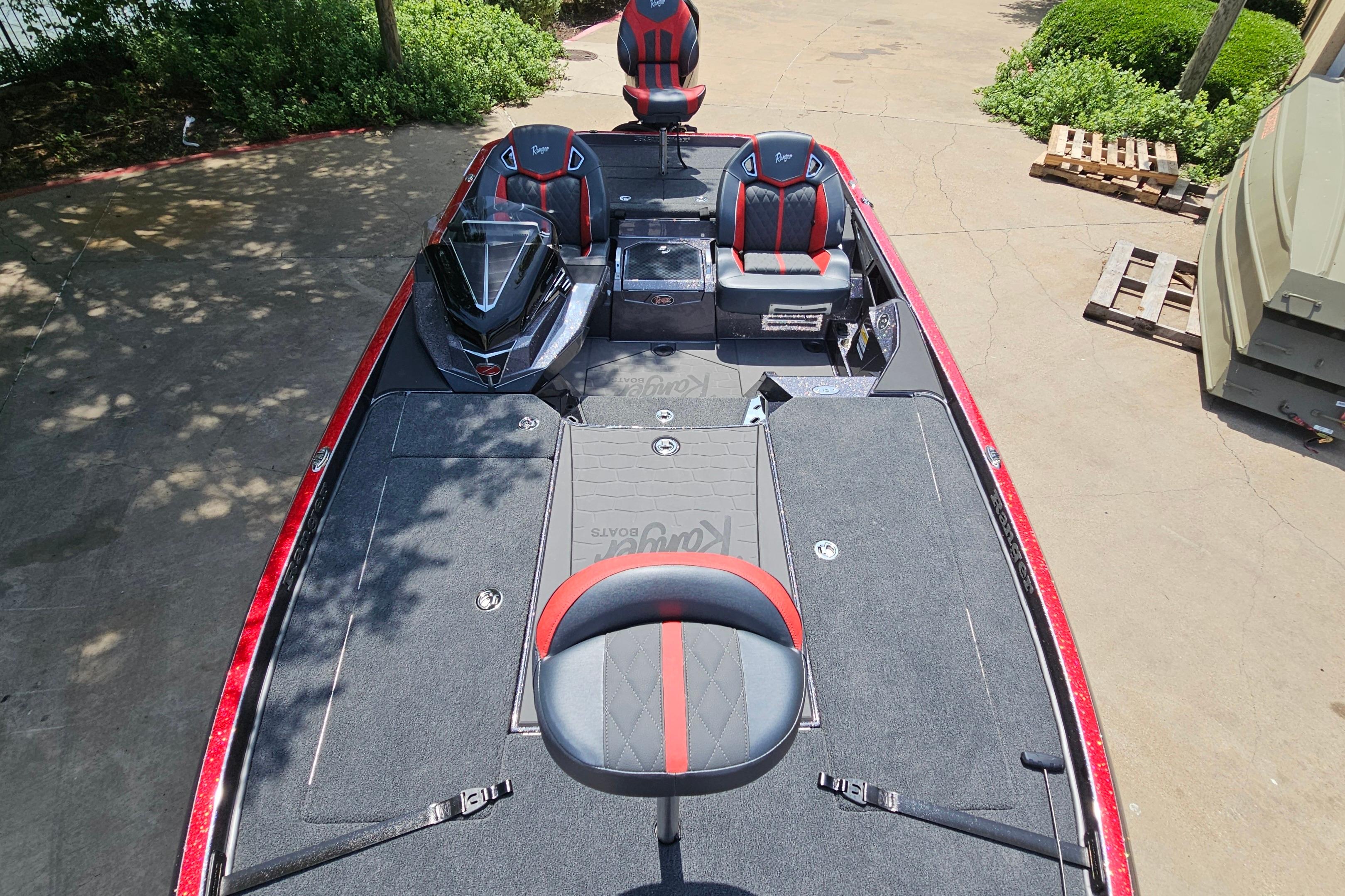 2026 Ranger Z520R boat interior with red and black seating, spacious deck, and modern design.