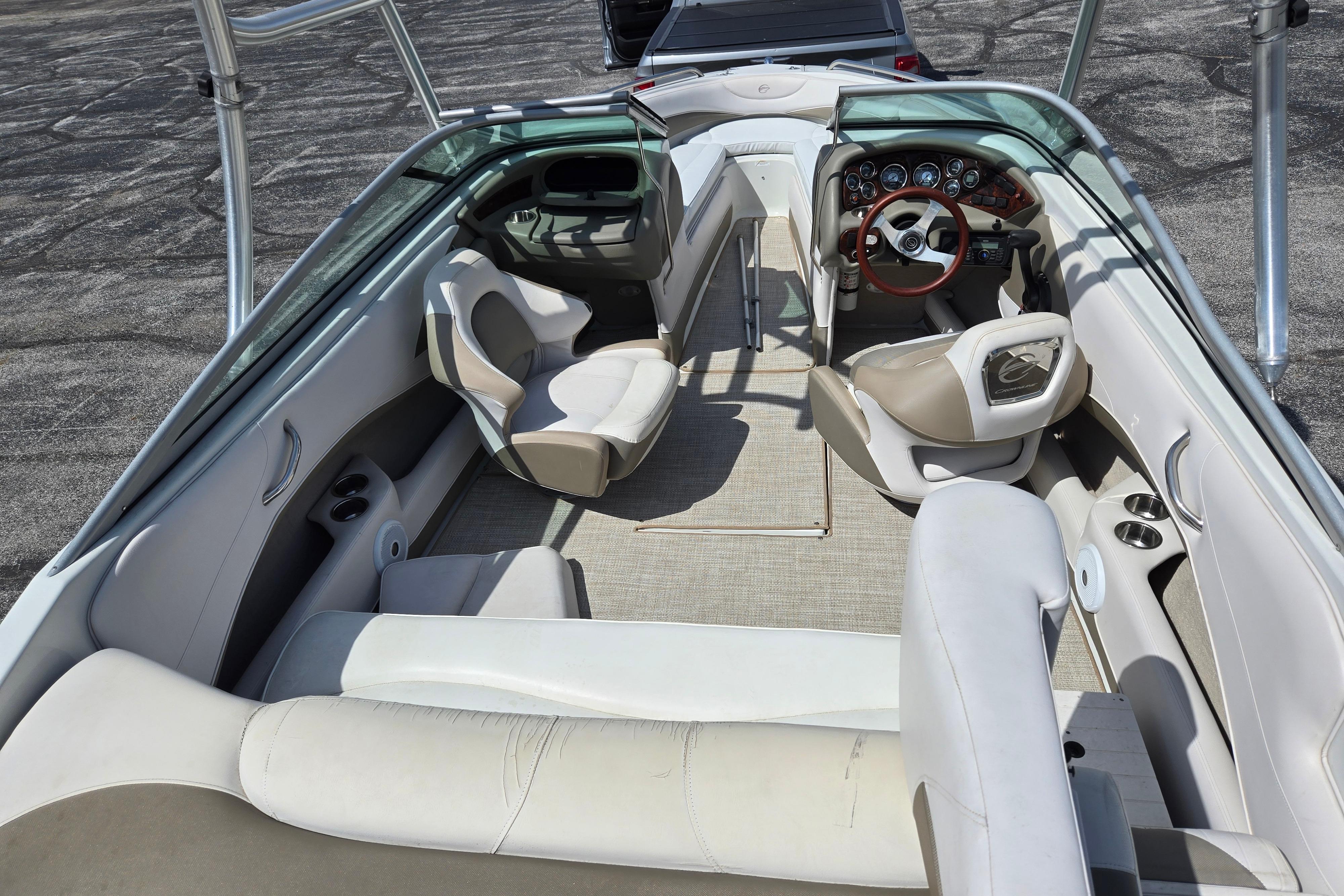 2014 Crownline 21 SS boat interior with seating and steering wheel.