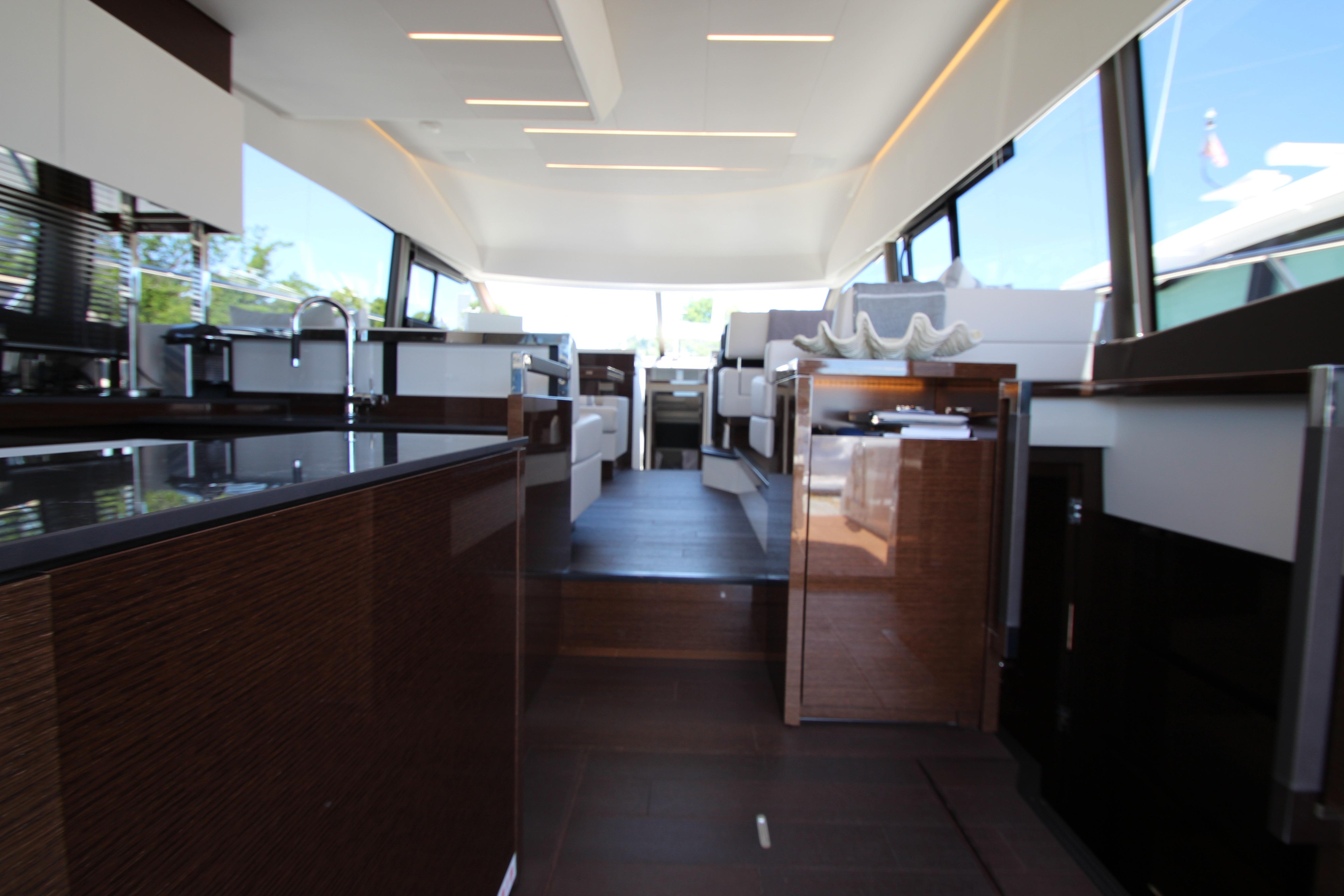 Luxurious interior of a 2022 Prestige 520 yacht, featuring modern design and sleek finishes.