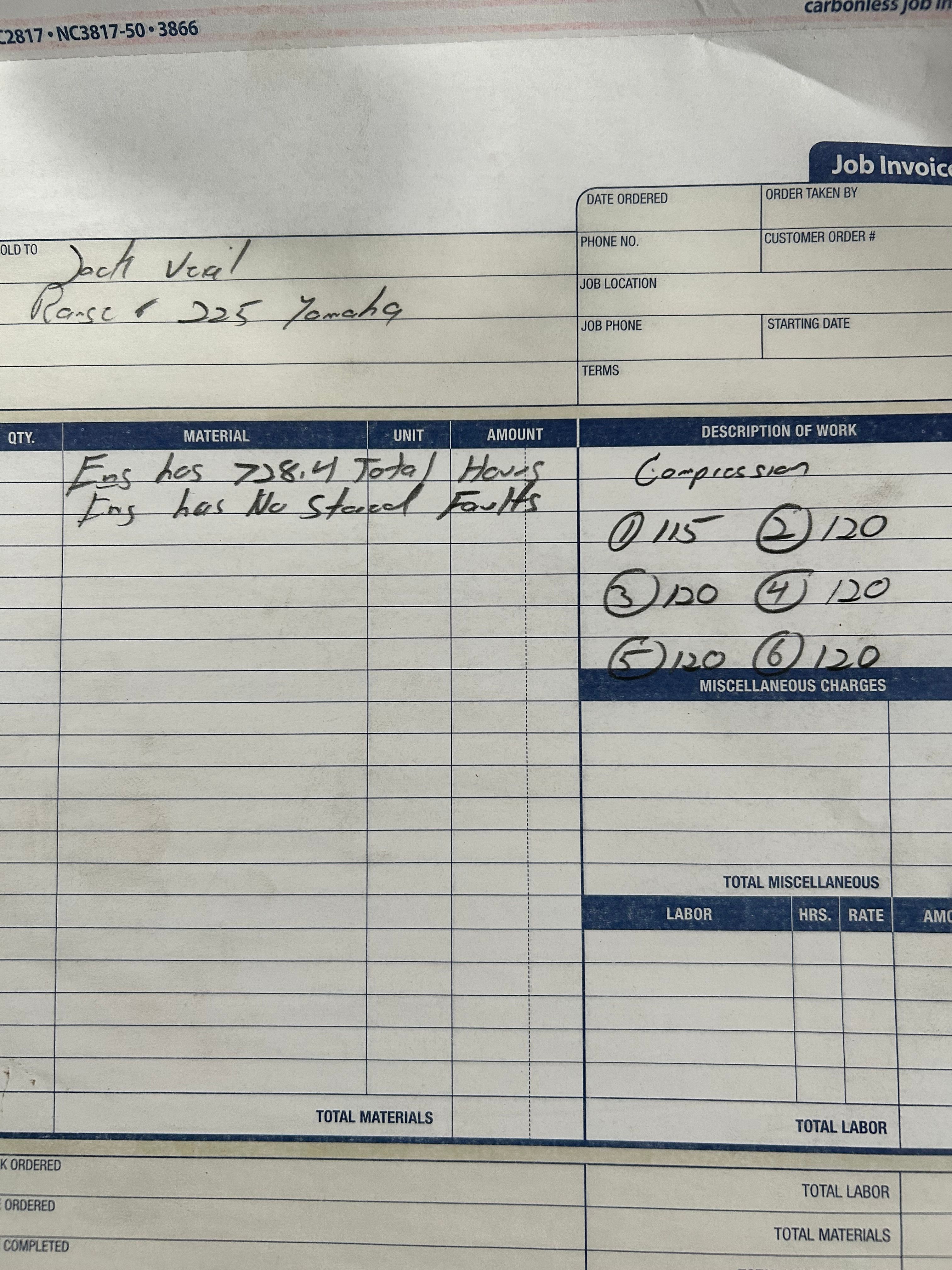 A job invoice with handwritten notes about engine hours and compression tests.