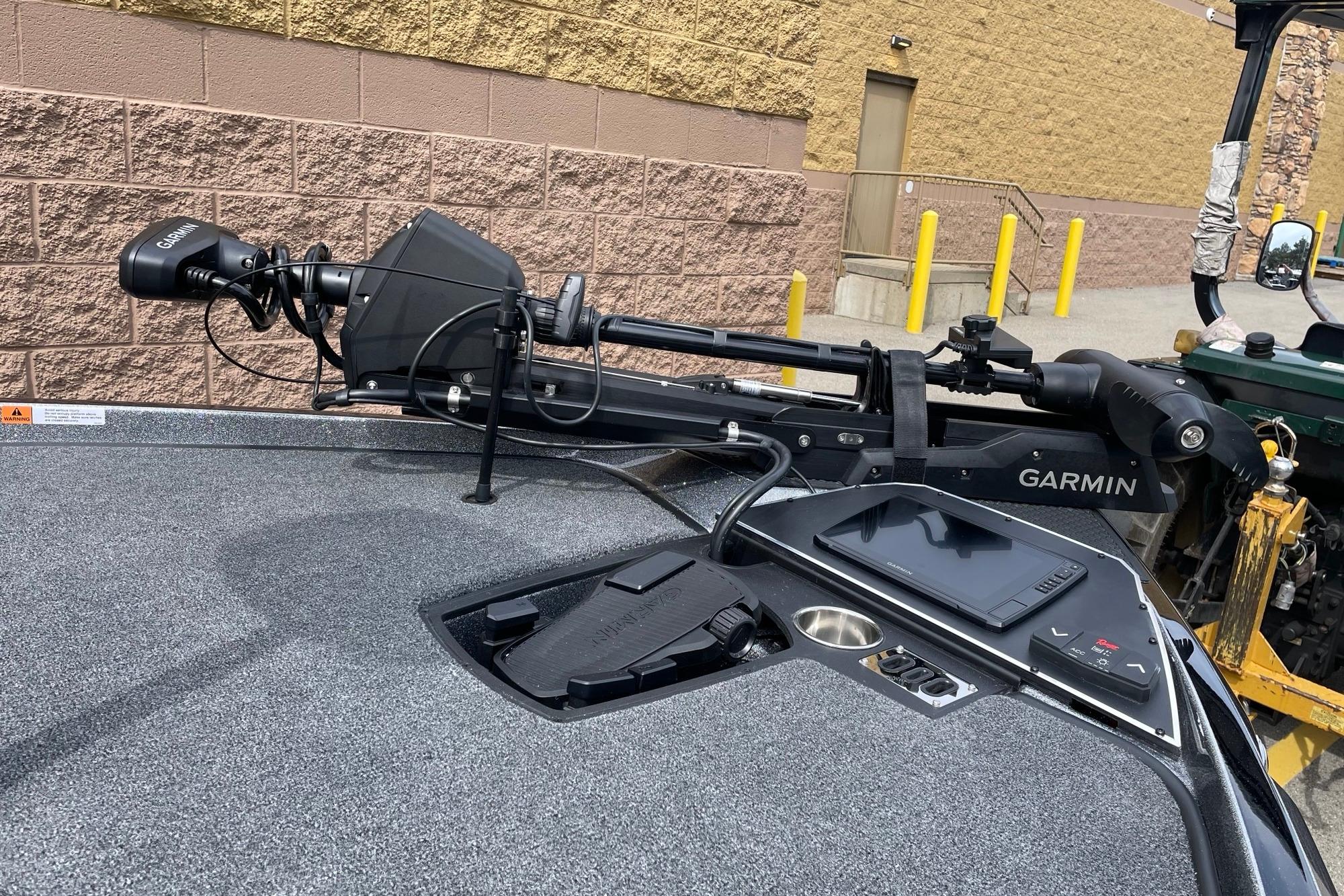 2026 Ranger Z520R boat with Garmin equipment, parked near a brick wall.
