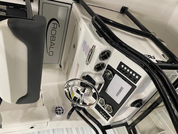2025 Robalo R202 Explorer boat dashboard with steering wheel and control panel.