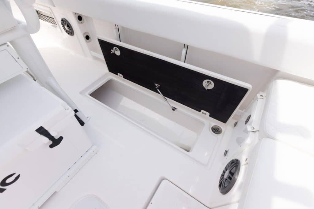 2027 Sea Fox 268 Commander boat interior with open storage compartment.