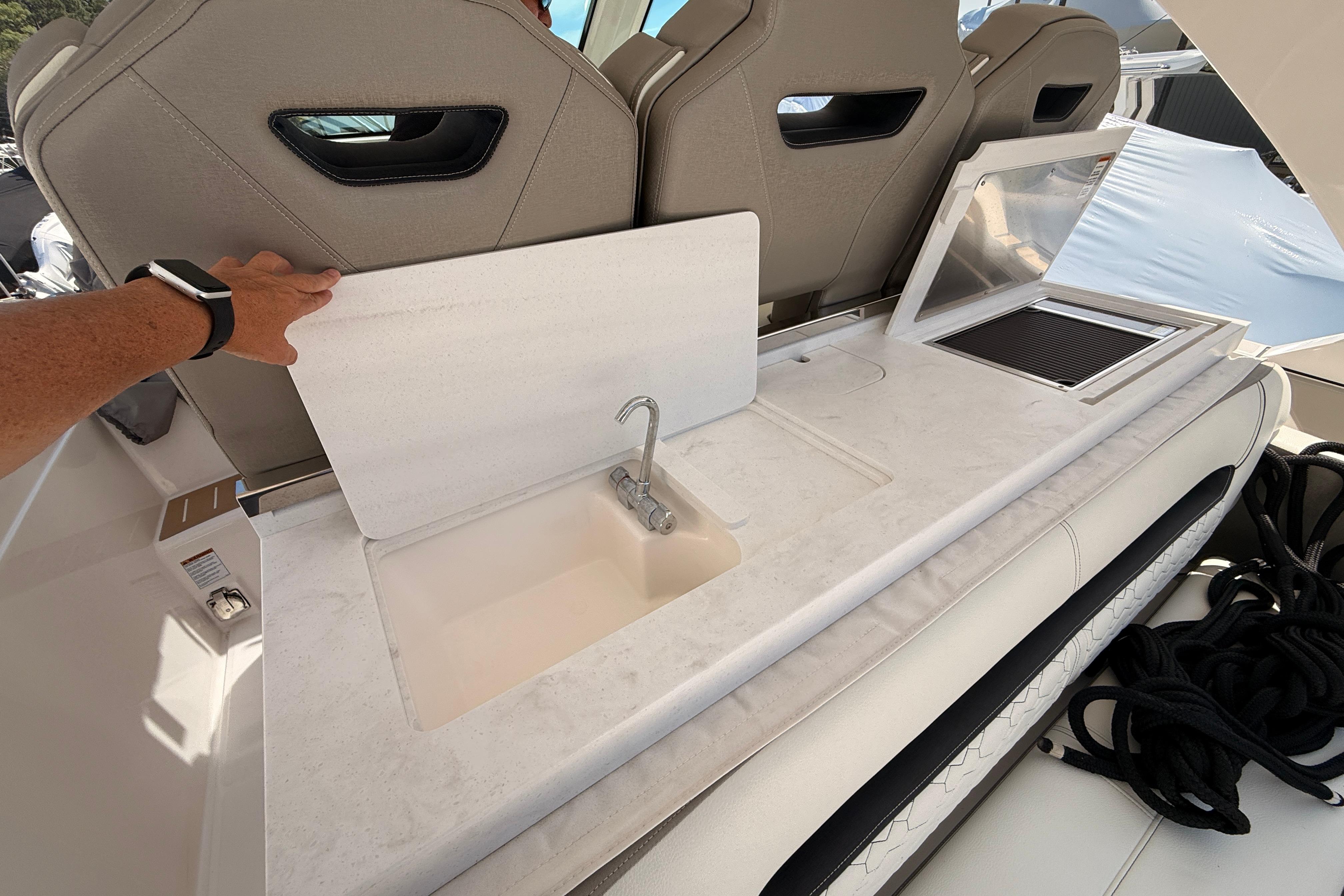 2024 Tiara Yachts 34 LS boat interior with sink and seating area.