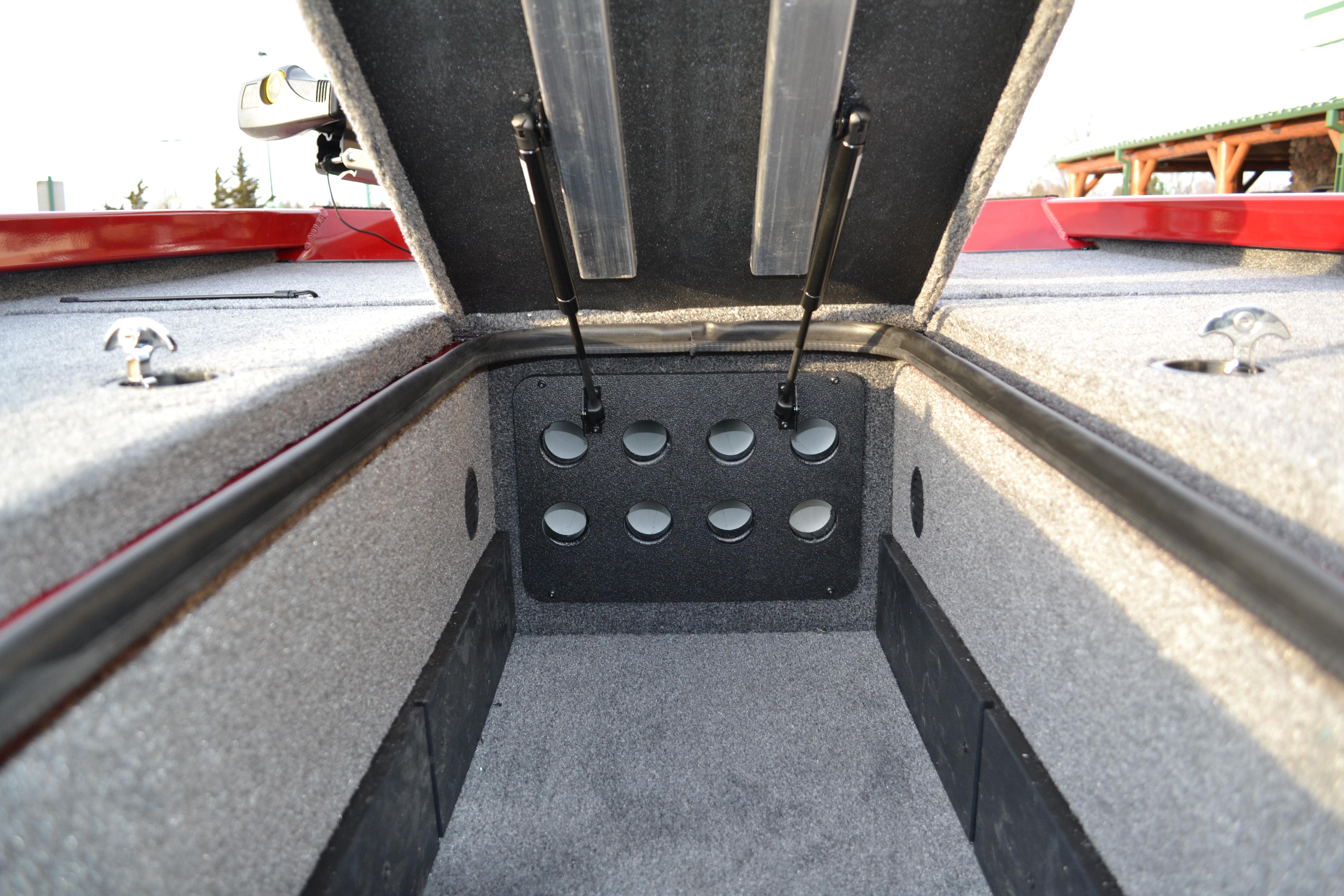2026 Ranger RT188 boat storage compartment with open lid and carpeted interior.