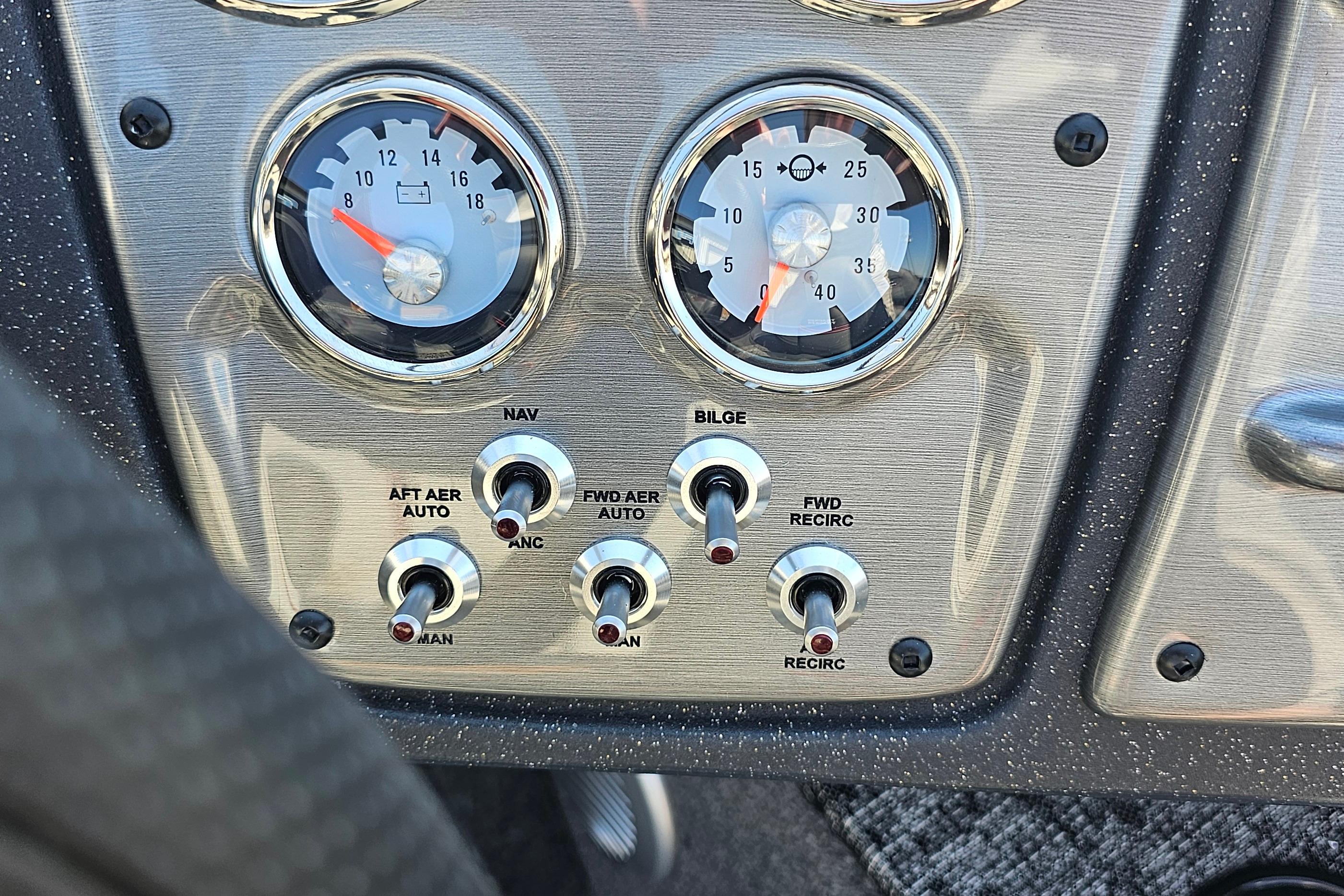 Dashboard of 2026 Tracker Pro Guide V-175 Combo with gauges and switches.