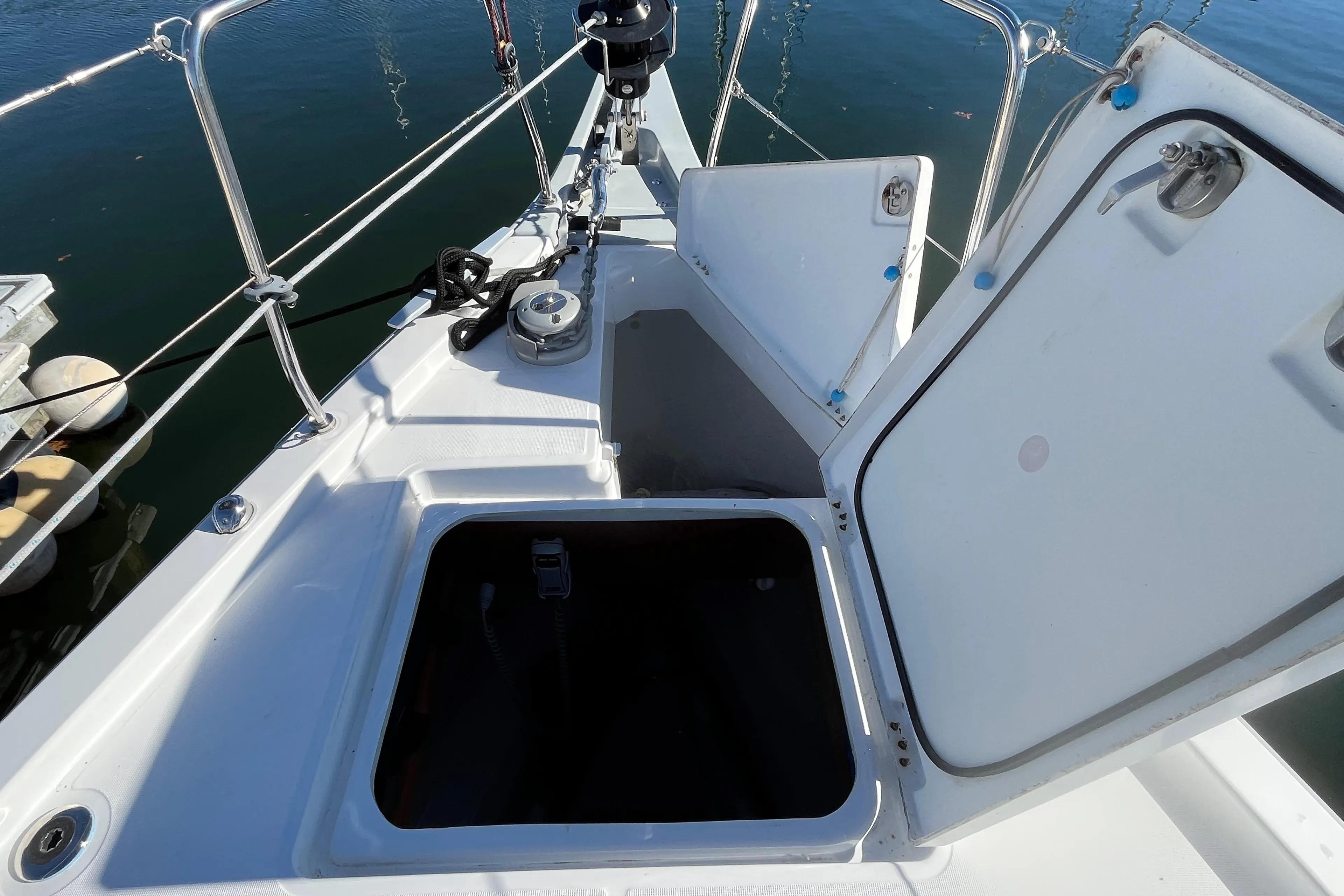 Beneteau Oceanis 46.1 (2020) yacht deck with open storage compartments.