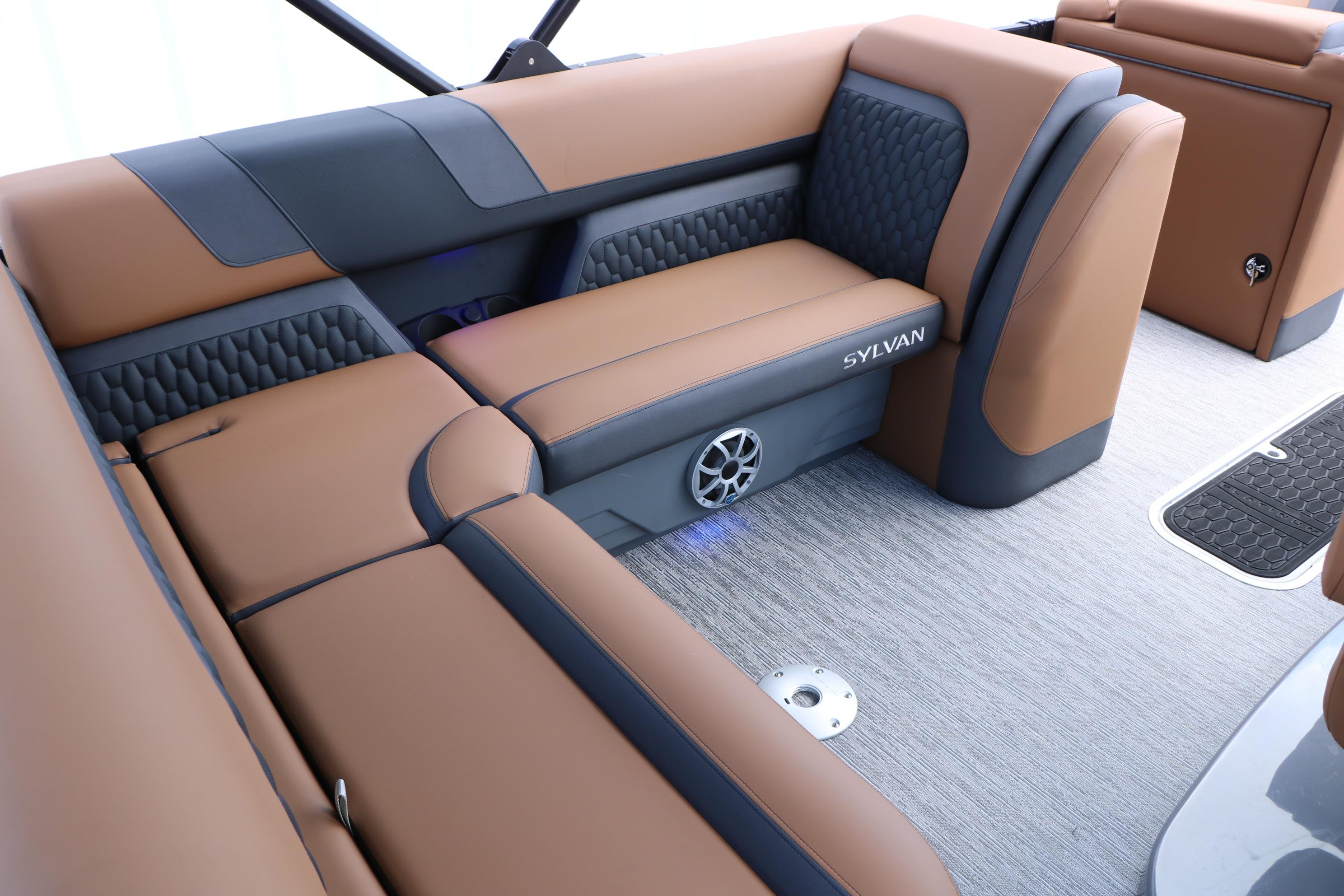 Luxurious seating on 2026 Sylvan L3 DLZ Bar Platinum Edition Tri-Toon boat interior.