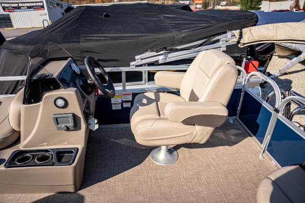 2025 Sun Tracker Bass Buggy 16 DLX boat interior with captain's chair and console.
