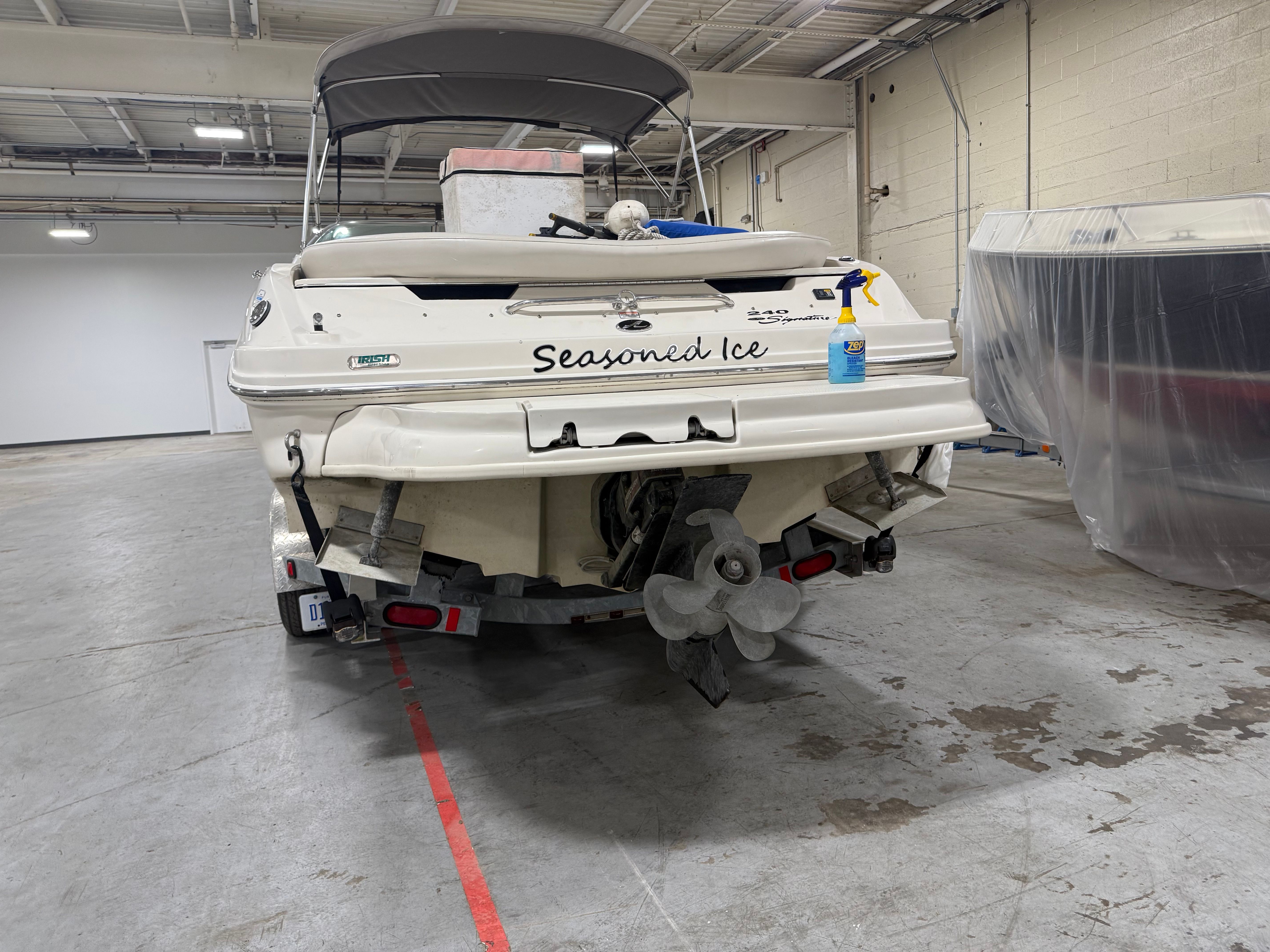 2003 Sea Ray 240 SIGNATURE boat in storage facility.