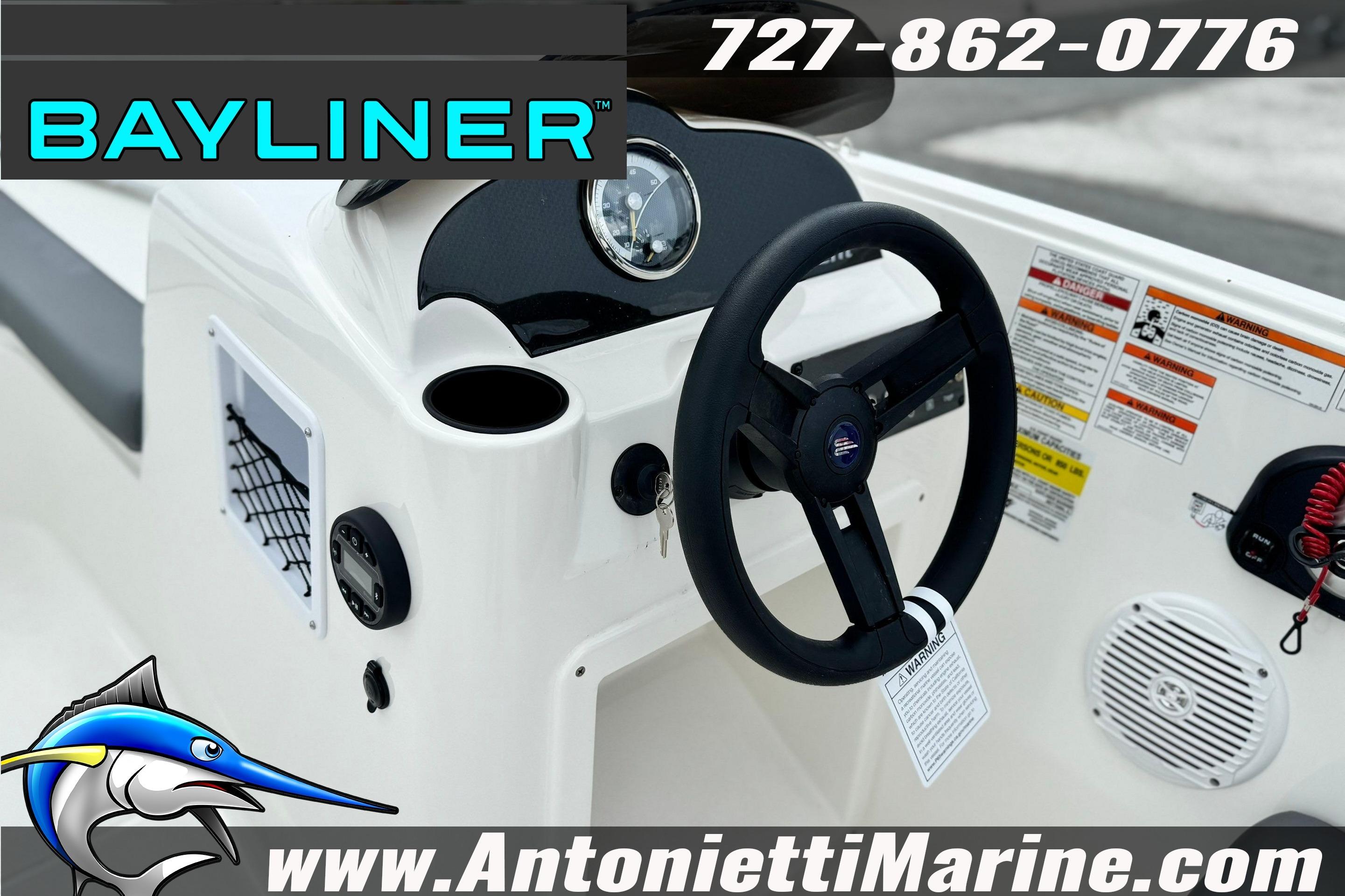 2026 Bayliner Element E16 boat dashboard with steering wheel and control panel.