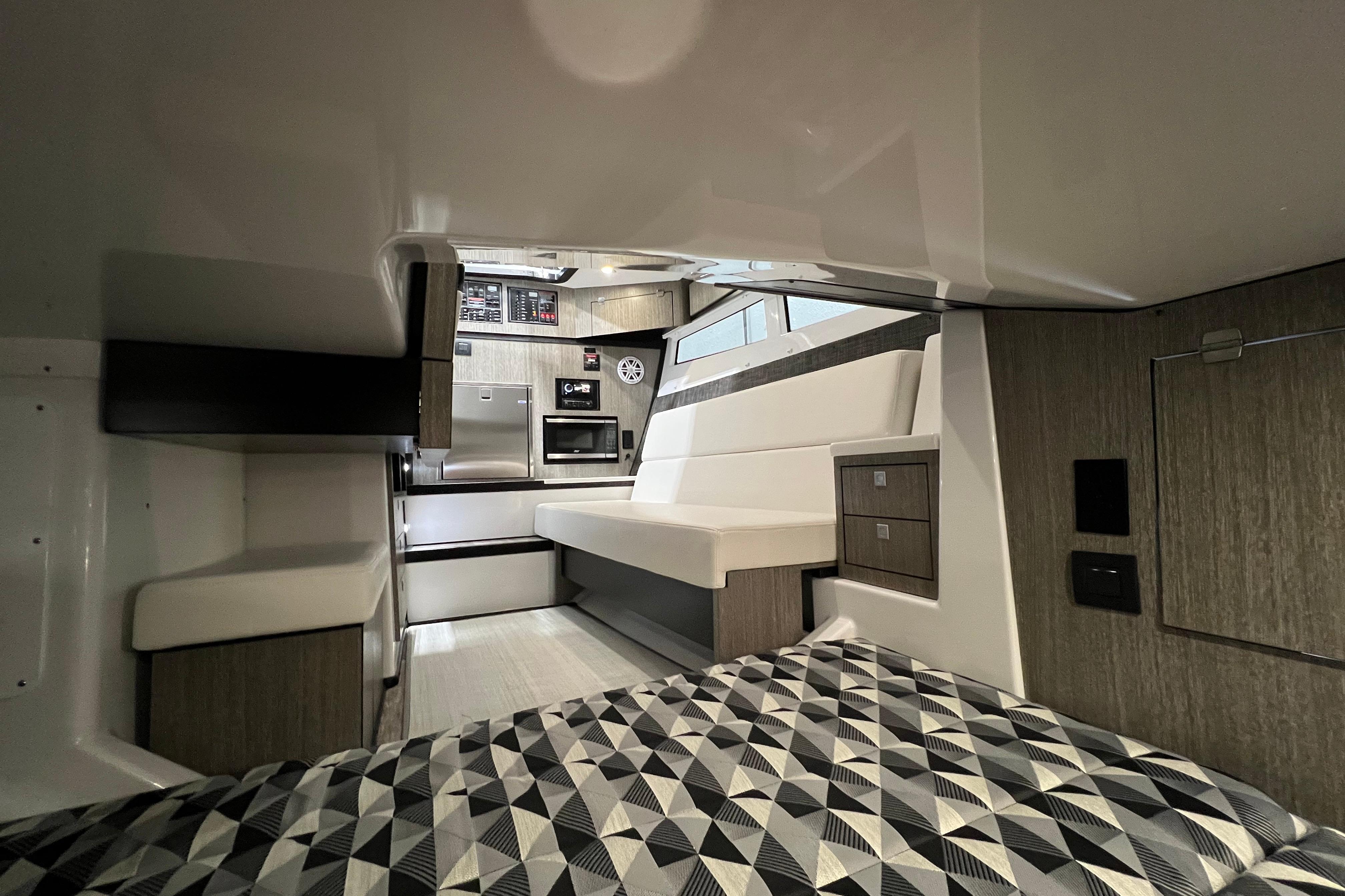 Interior of 2023 Monterey 378SS Super Sport boat, featuring modern seating and sleek design.