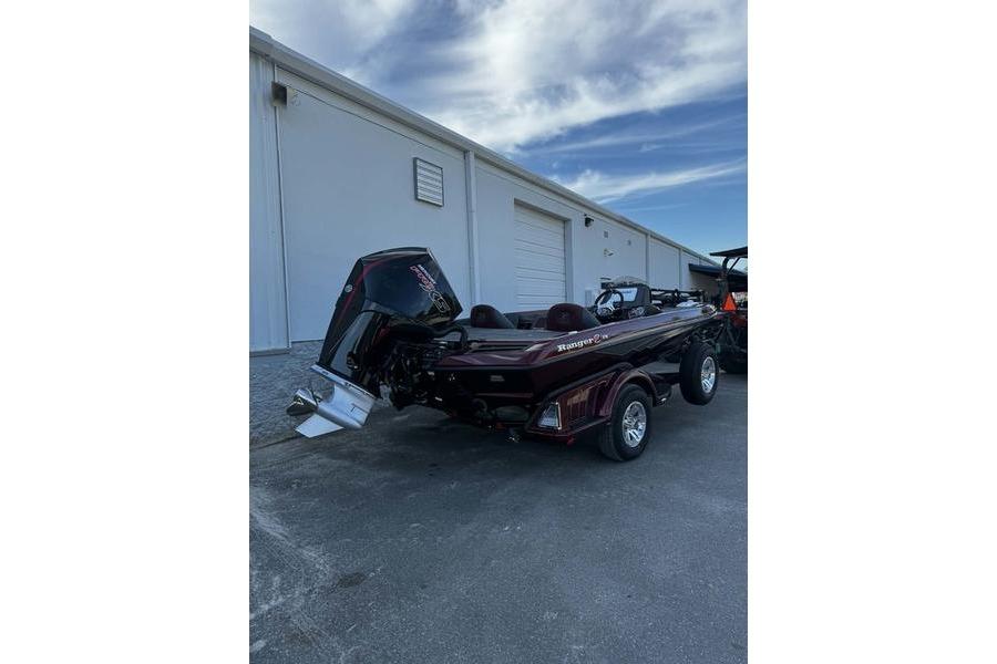 2026 Ranger Z518 Cup-Equipped boat parked outside a warehouse.