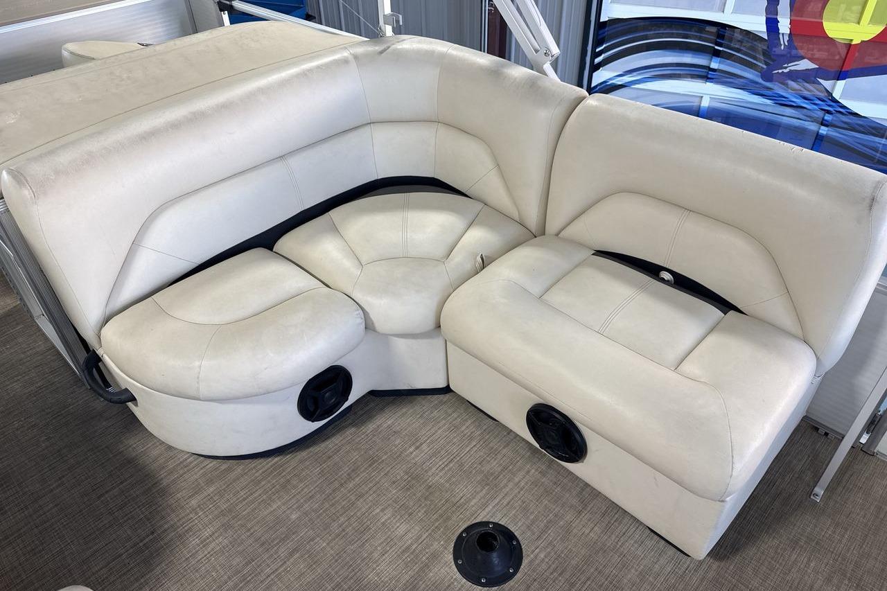 2018 Landau Alure 212 Fish boat interior with white cushioned seating.