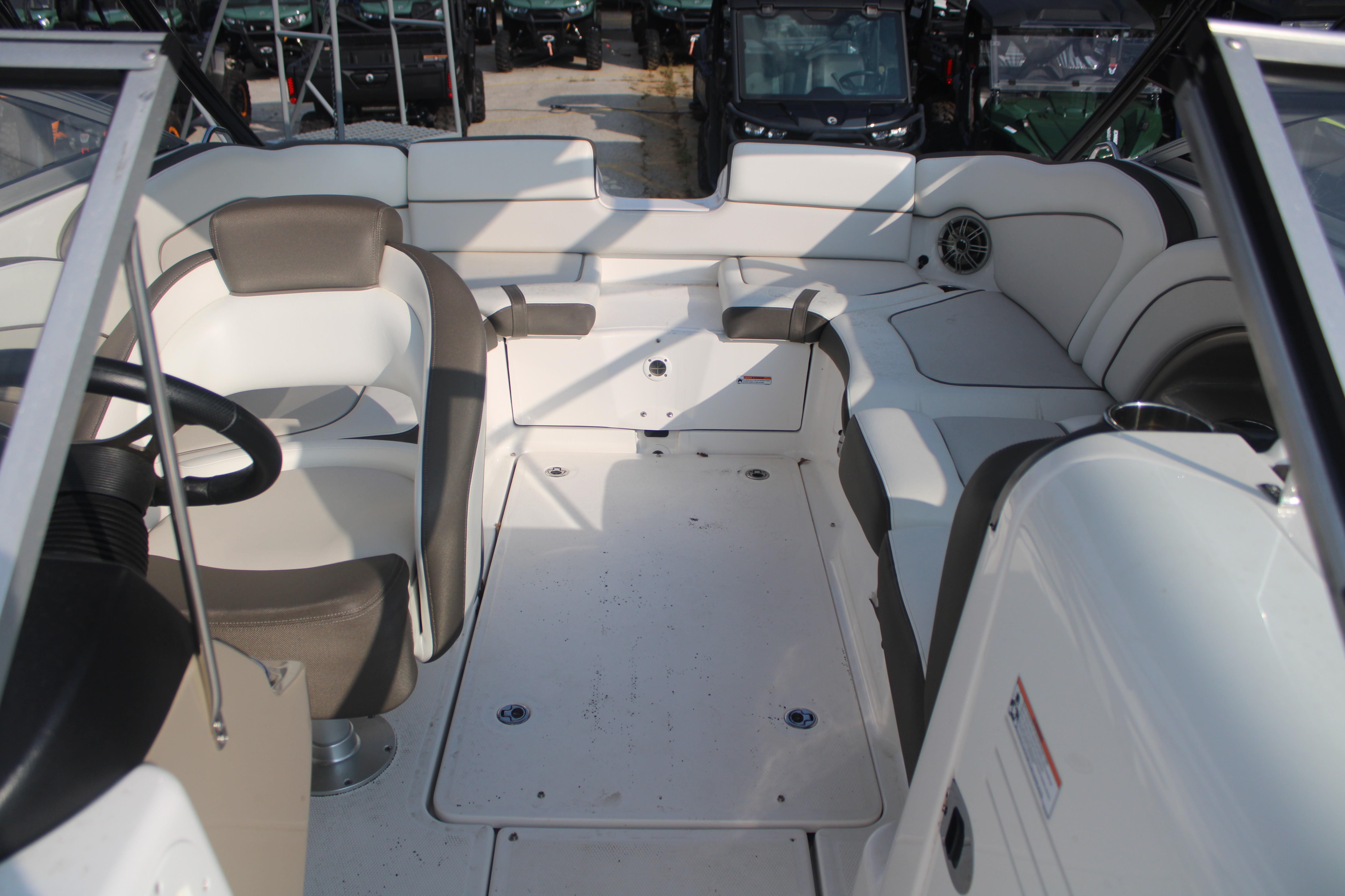 Interior of 2013 Yamaha Boats 242 Limited S, featuring spacious seating and modern design.