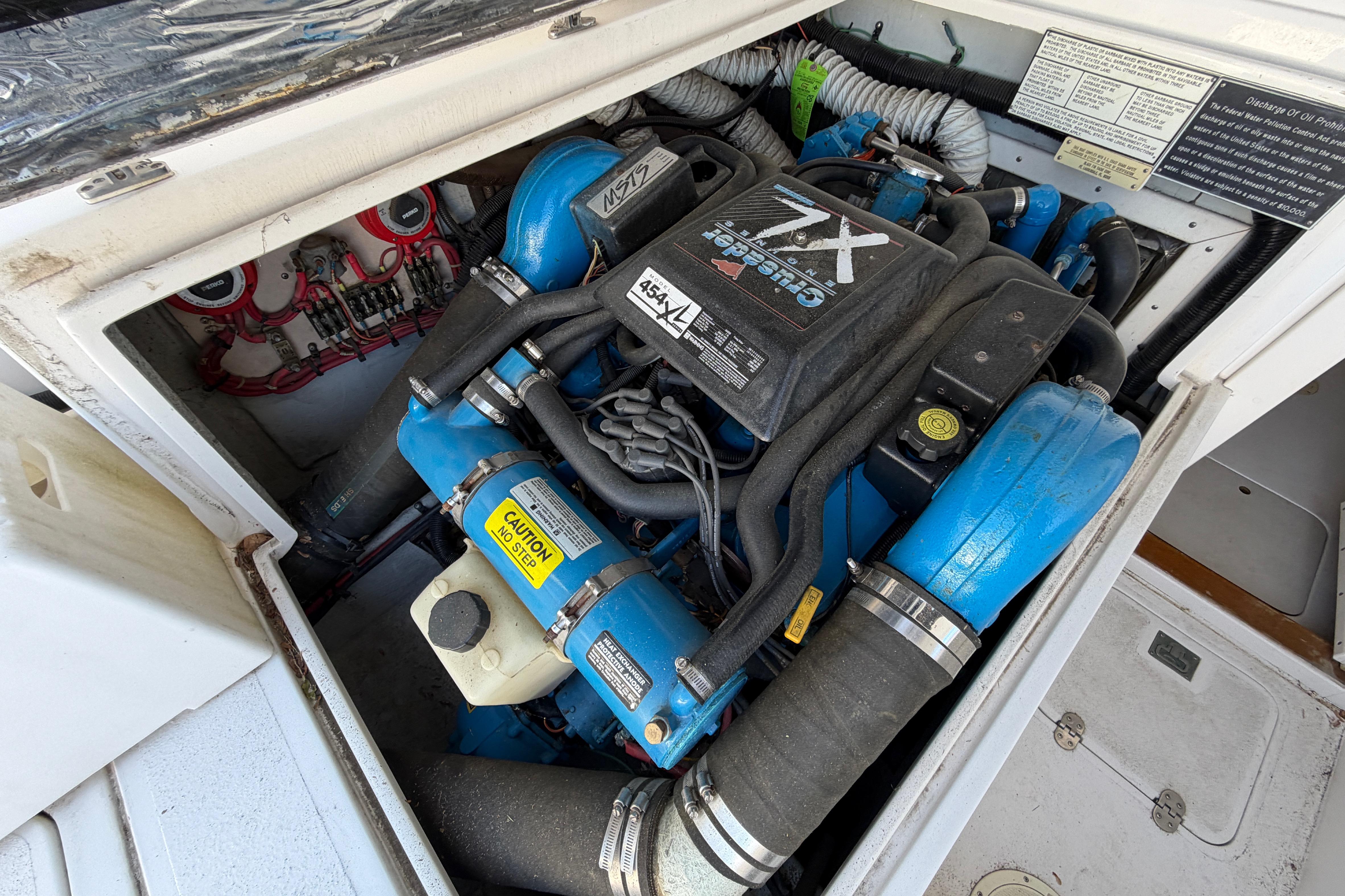 Engine compartment of a 1995 Blackfin 29 Flybridge boat, featuring Crusader XL engine.