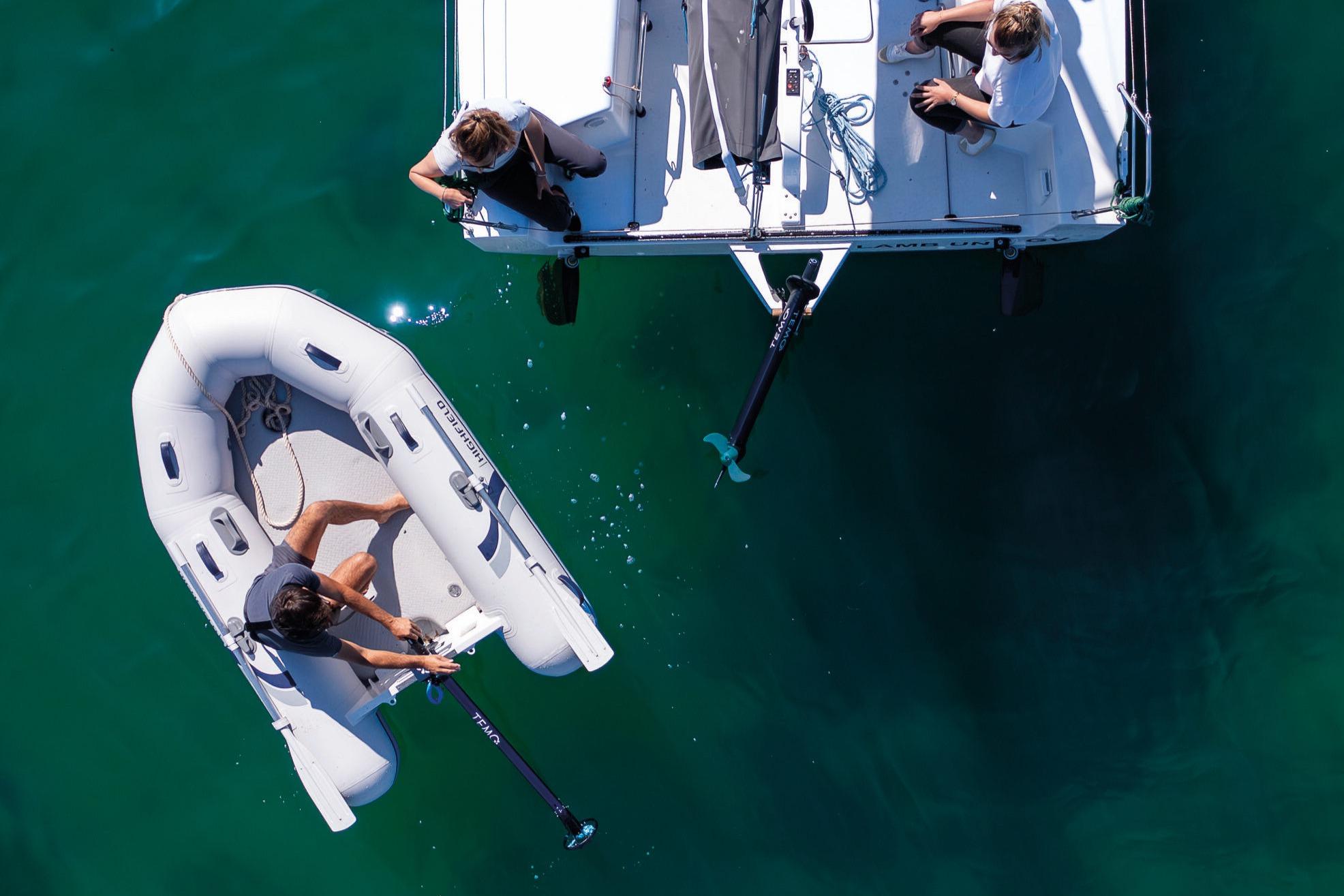 Aerial view of Highfield Roll-Up 250 KAL inflatable boat on water.