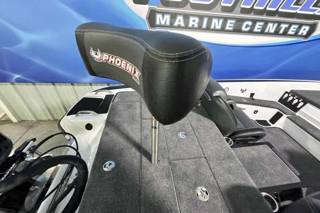 2026 Phoenix 818 Pro boat seat at a marine center display.