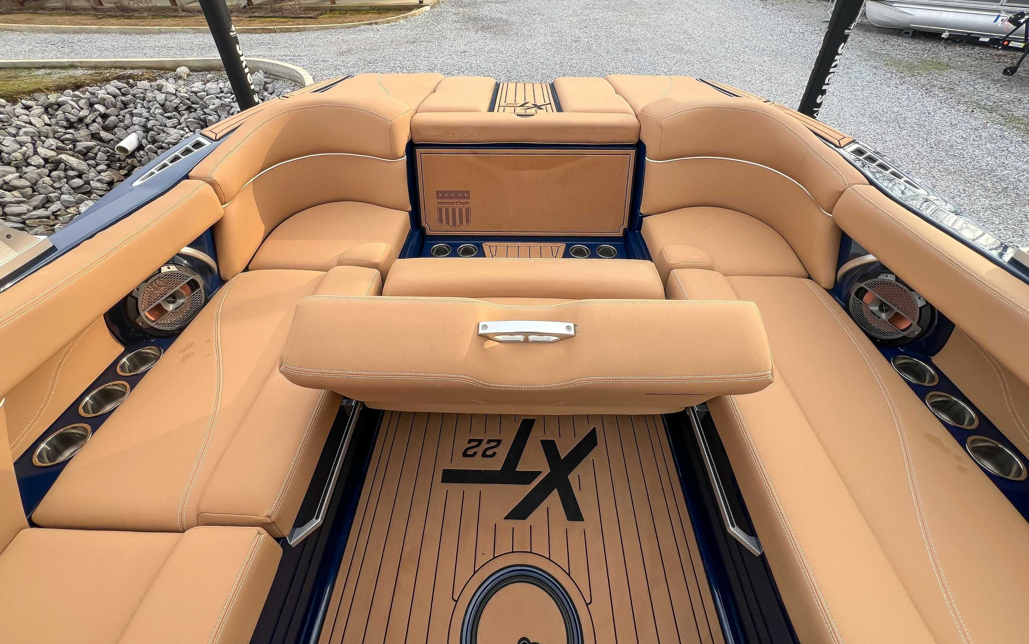 Interior of a 2021 MasterCraft XT22 with beige seating.