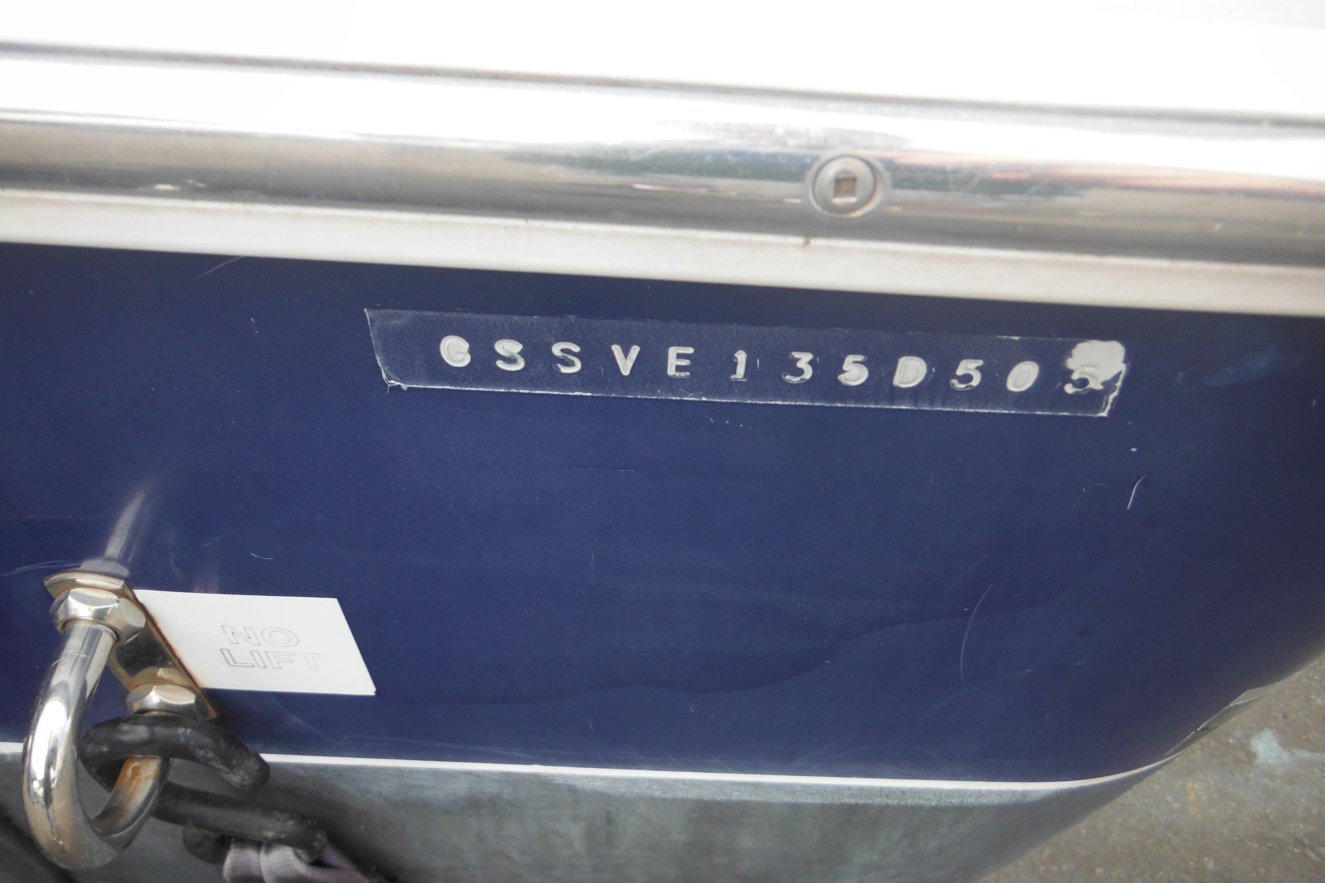 2005 Seaswirl Striper 2101 Walkaround O/B hull identification number on blue surface.