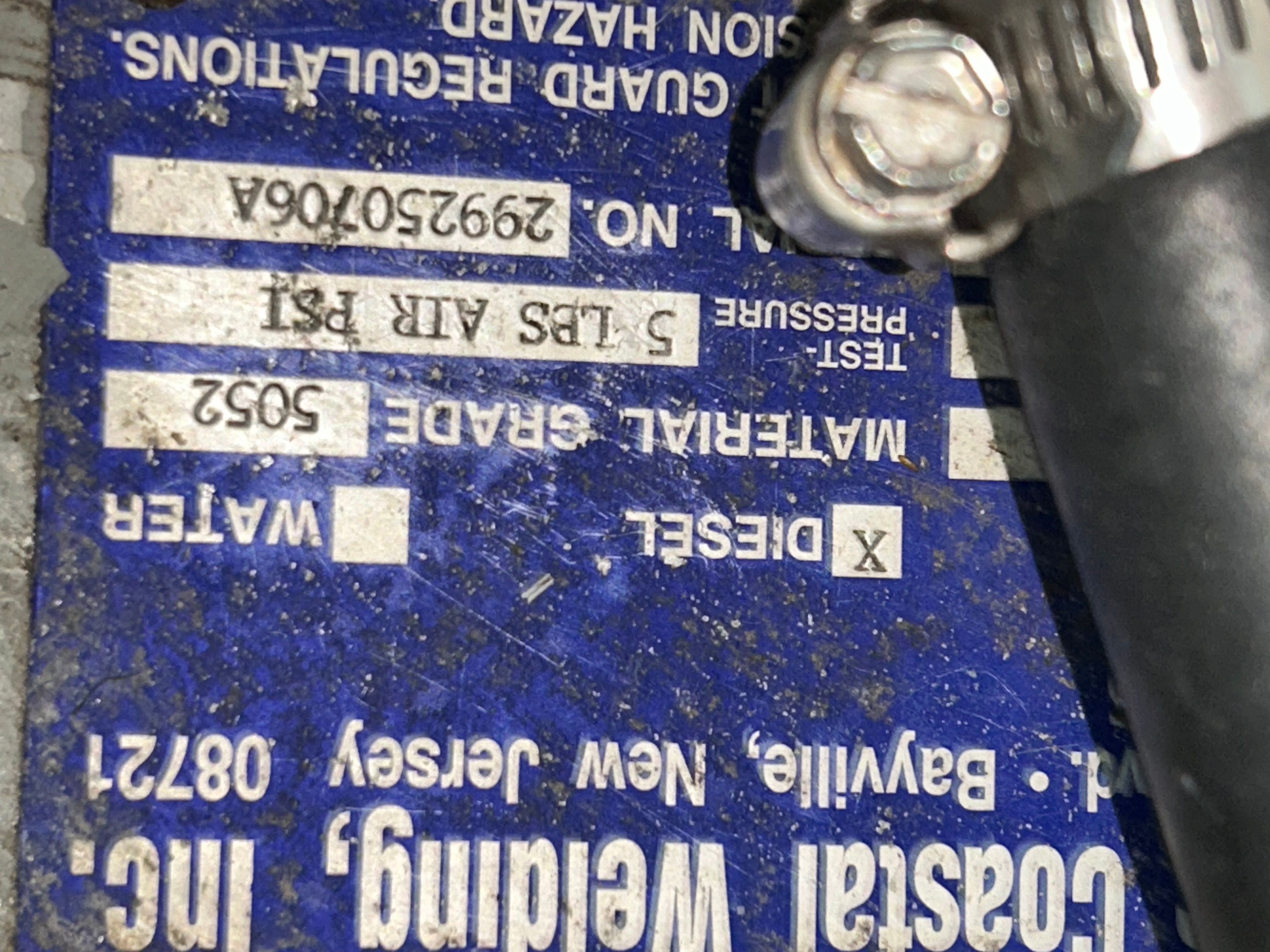 Close-up of a Bertram Flybridge Cruiser nameplate, year 1970.