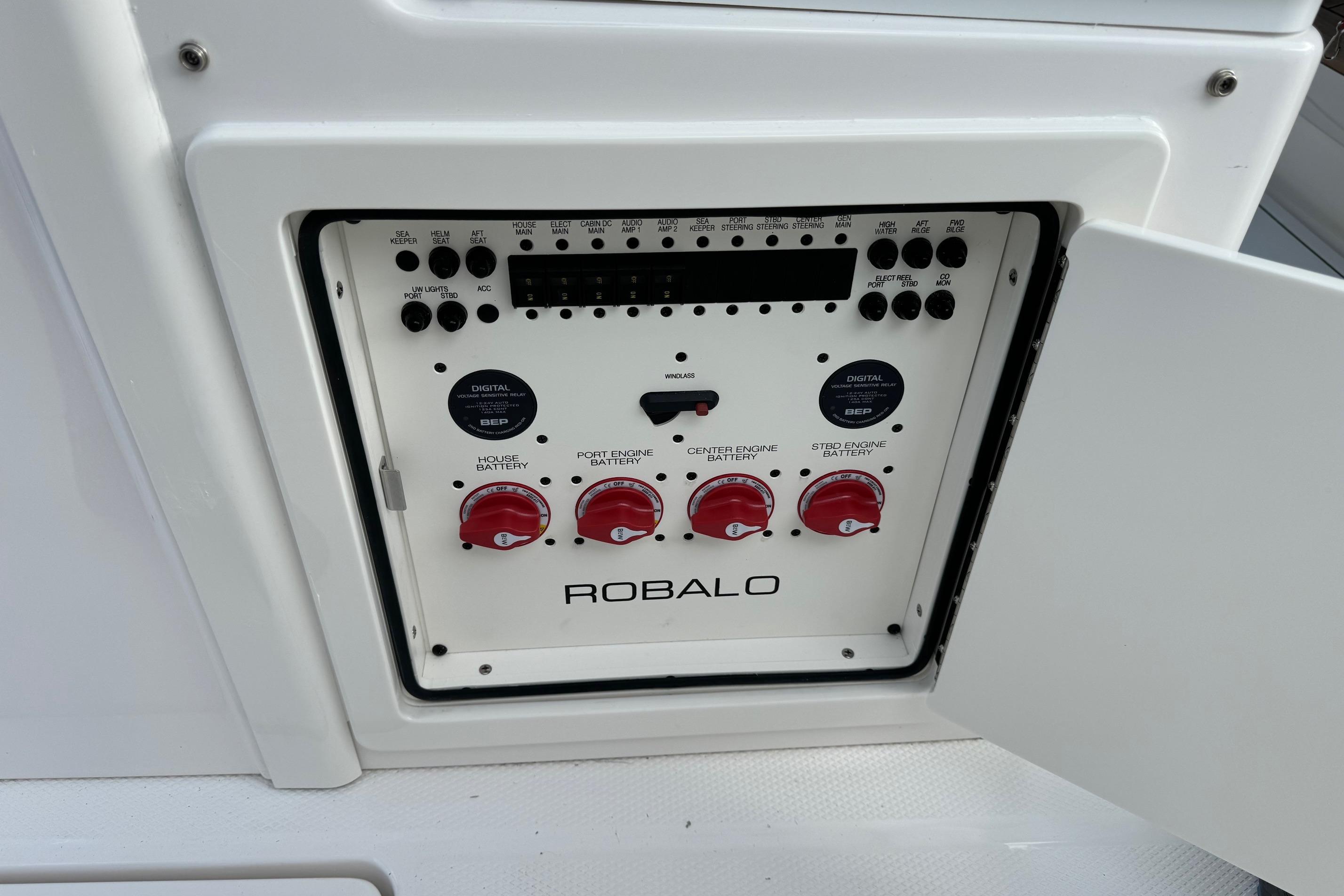 Control panel of 2025 Robalo R360 Center Console boat with battery switches.