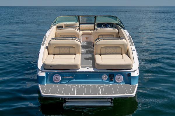 Manufacturer Provided Image: 2026 Regal LS6 boat with beige seating on open water.