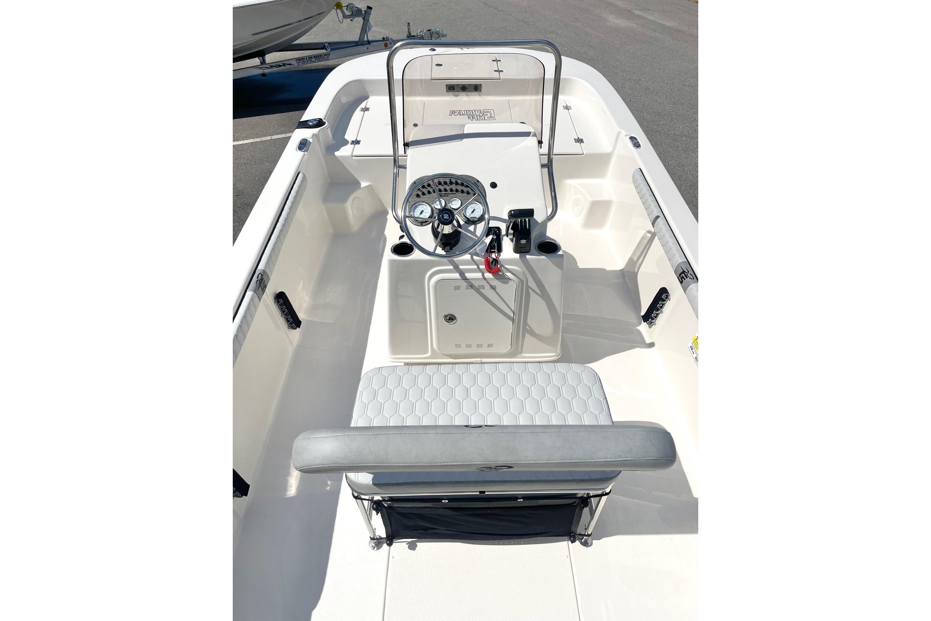 2026 Carolina Skiff 19 LS boat interior with steering console and seating.