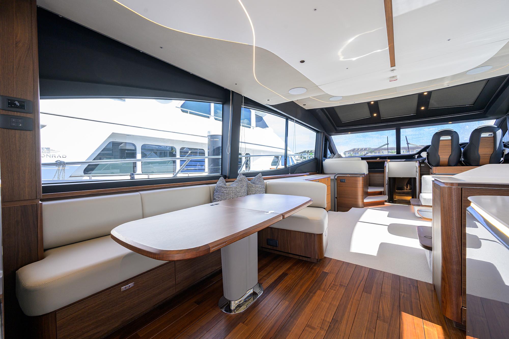 Luxurious interior of 2026 Princess S72 yacht with elegant seating and modern design.