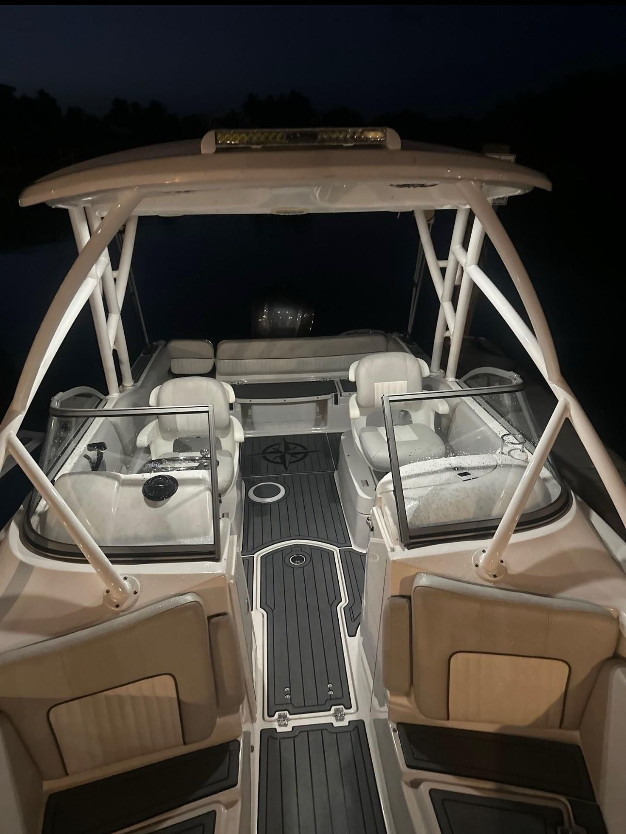 Interior view of a Sea Fox 226 Traveler boat at night.