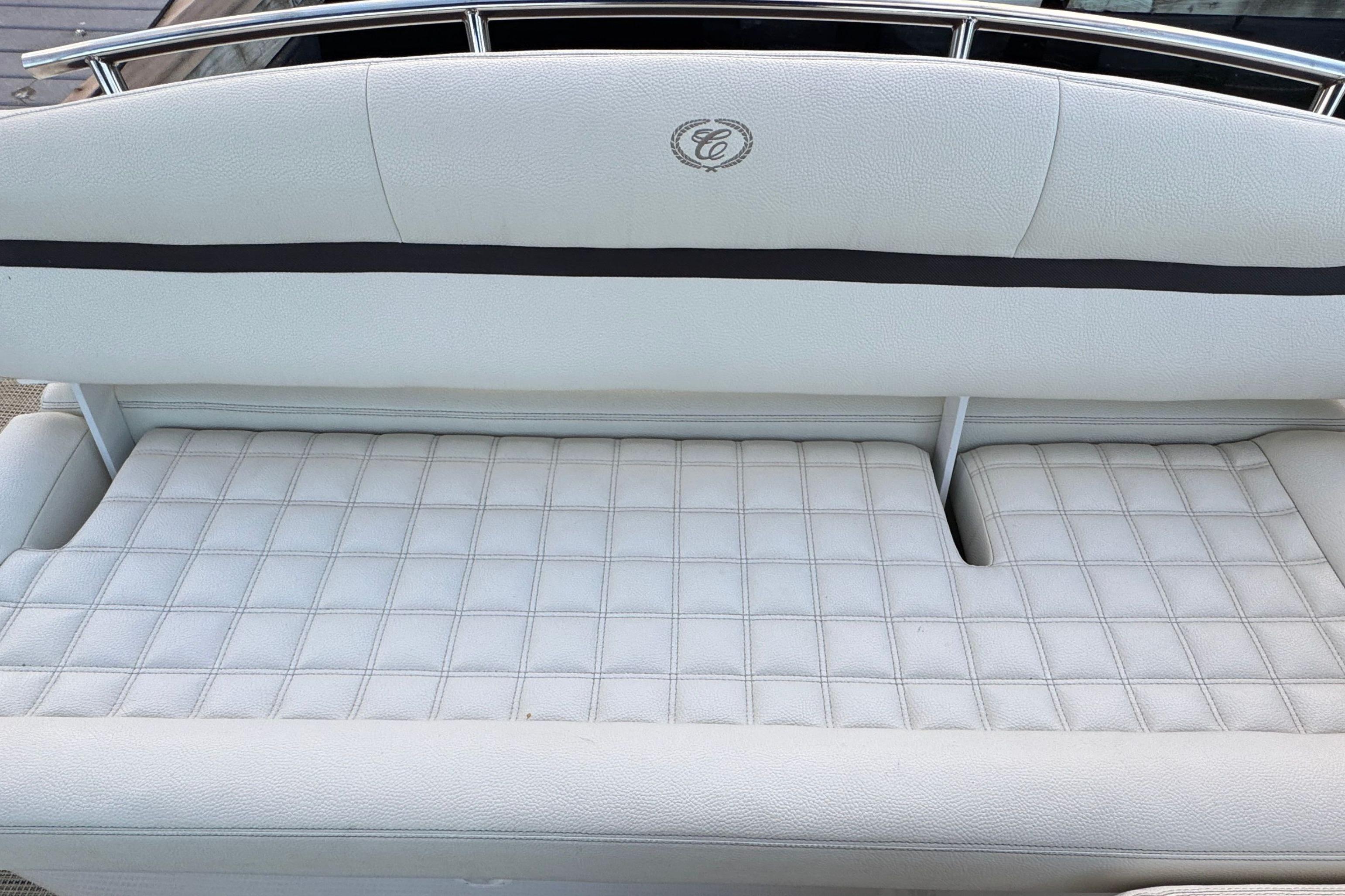 2019 Cobalt R3 boat seat with white quilted upholstery and logo detail.