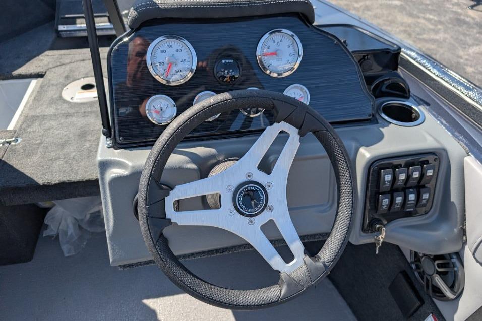 2026 Starcraft Superfisherman 186 dashboard with steering wheel and gauges.